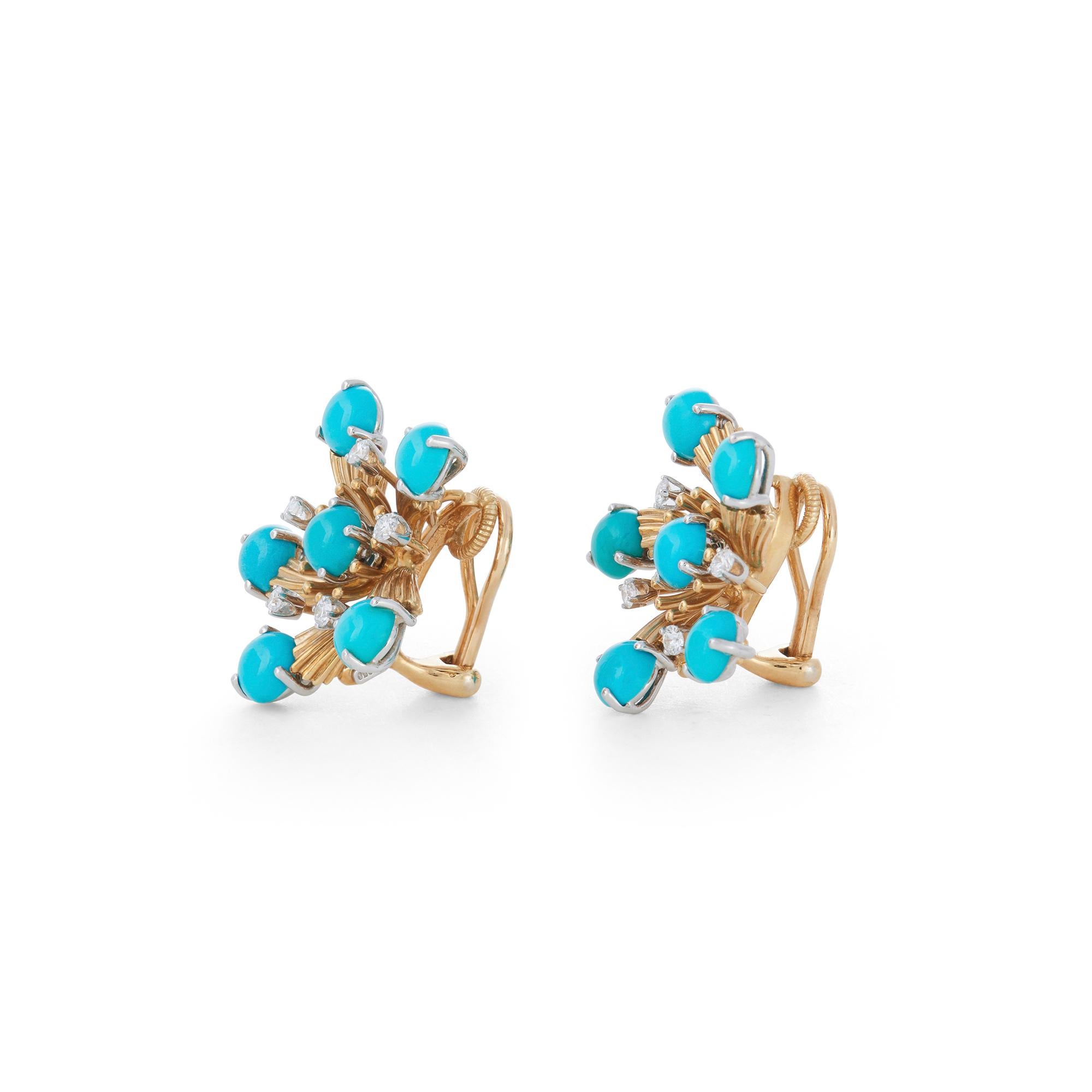 Authentic Jean Schlumberger for Tiffany & Co. ear clips crafted in 18k yellow gold and platinum to resemble snowflakes. The clips are set with round cabochon turquoise and high-quality round brilliant cut diamonds weighing an estimated 0.50 carats