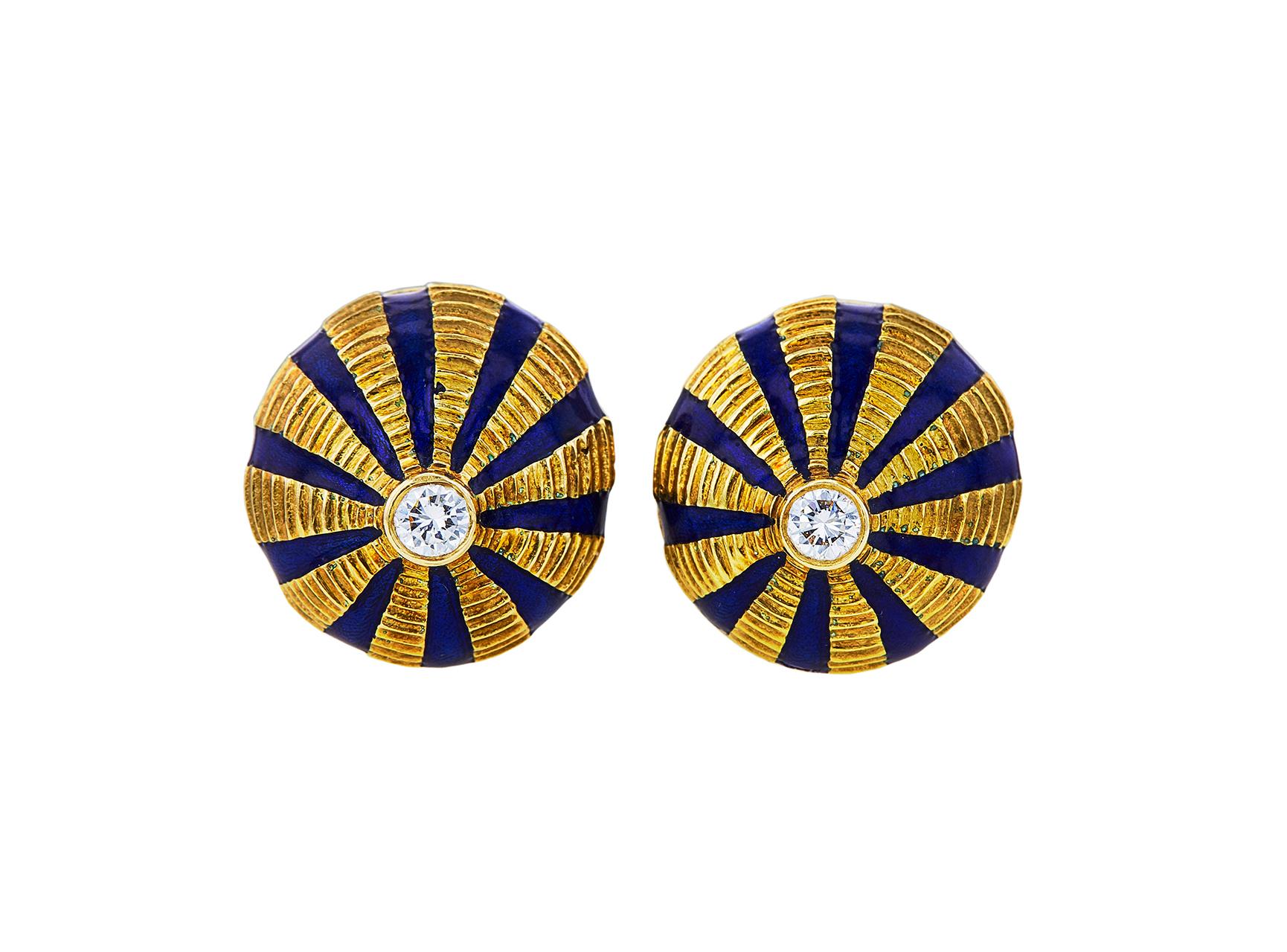 Authentic Jean Schlumberger for Tiffany & Co. Taj Mahal ear clips. Crafted in 18 karat yellow gold and applied with blue enamel, centering two round brilliant cut diamonds (G-H, VS) weighing an estimated 0.26 carats total weight. The ear clips