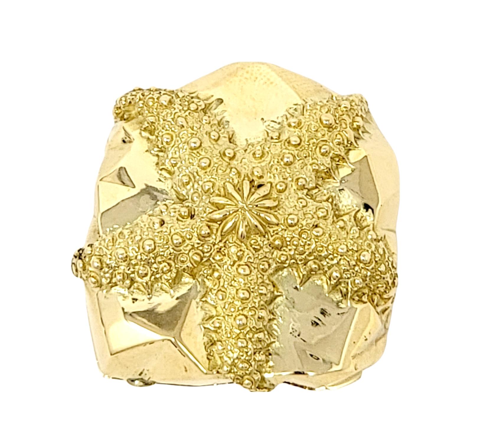 Incredible 18 karat yellow gold vintage pill box. This charming little case was designed by Jean Schlumberger for Tiffany & Co.. It features a beautifully textured starfish motif sitting on top of the polished gold box. The sea creature wraps itself