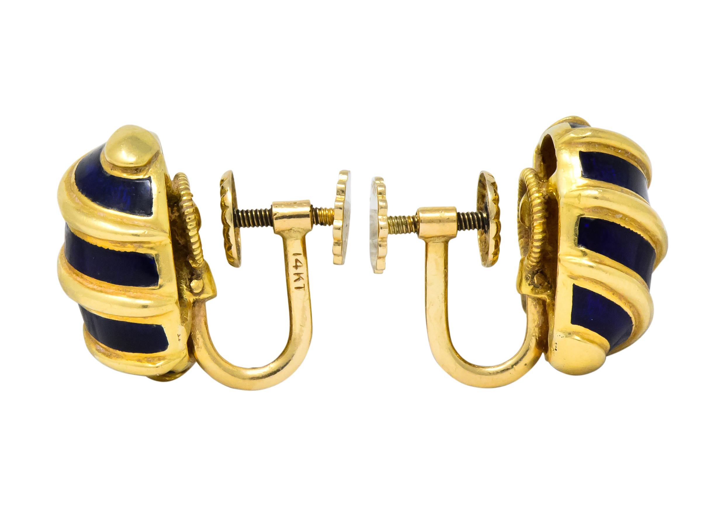 Featuring oval domed gold with deep cobalt blue enamel and ribbed accents

Schlumberger renowned for enamel upon gold technique

Verso of dome signed Tiffany Schlumberger 18k

Circa 1960's

Later added screwback findings marked 14k

Measures 5/8 x