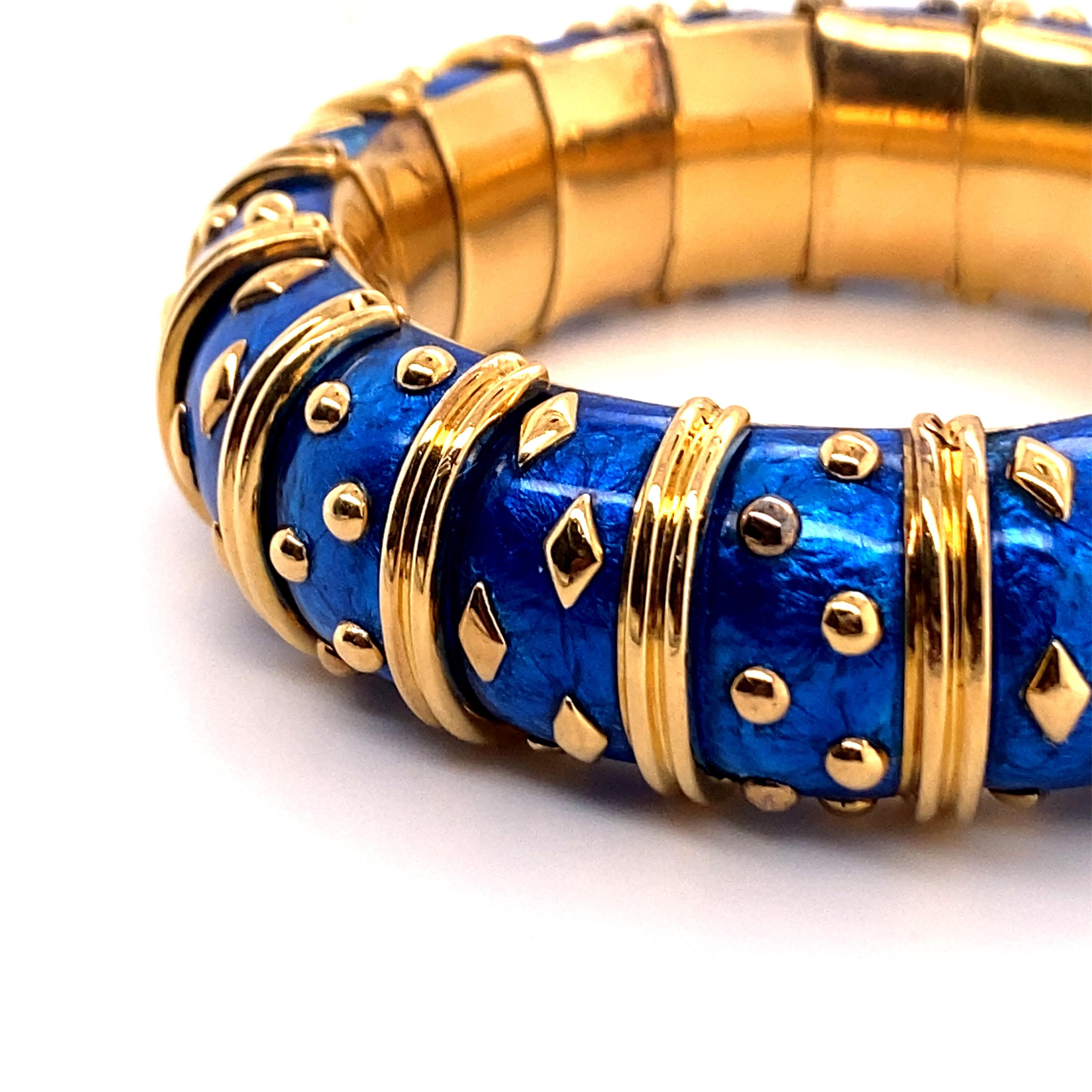 The bracelet is created using a 19th century enameling technique referred to as paillonné, alternately-set with polished gold circular and navette-shaped accents, enhanced by gold ribbed spacers, mounted in 18k yellow gold. Jean Schlumberger