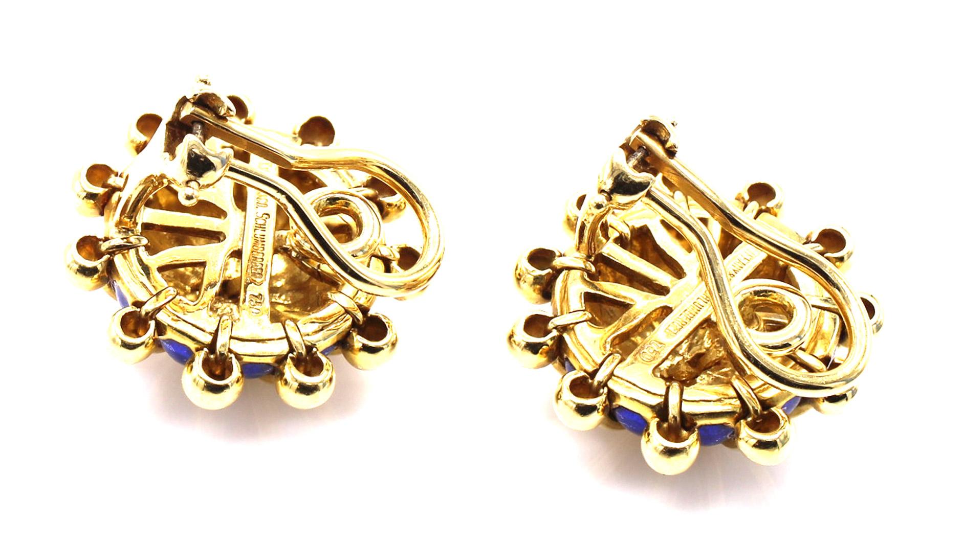 Beautifully designed and masterfully handcrafted in 18 karat yellow gold and blue enamel, these iconic 