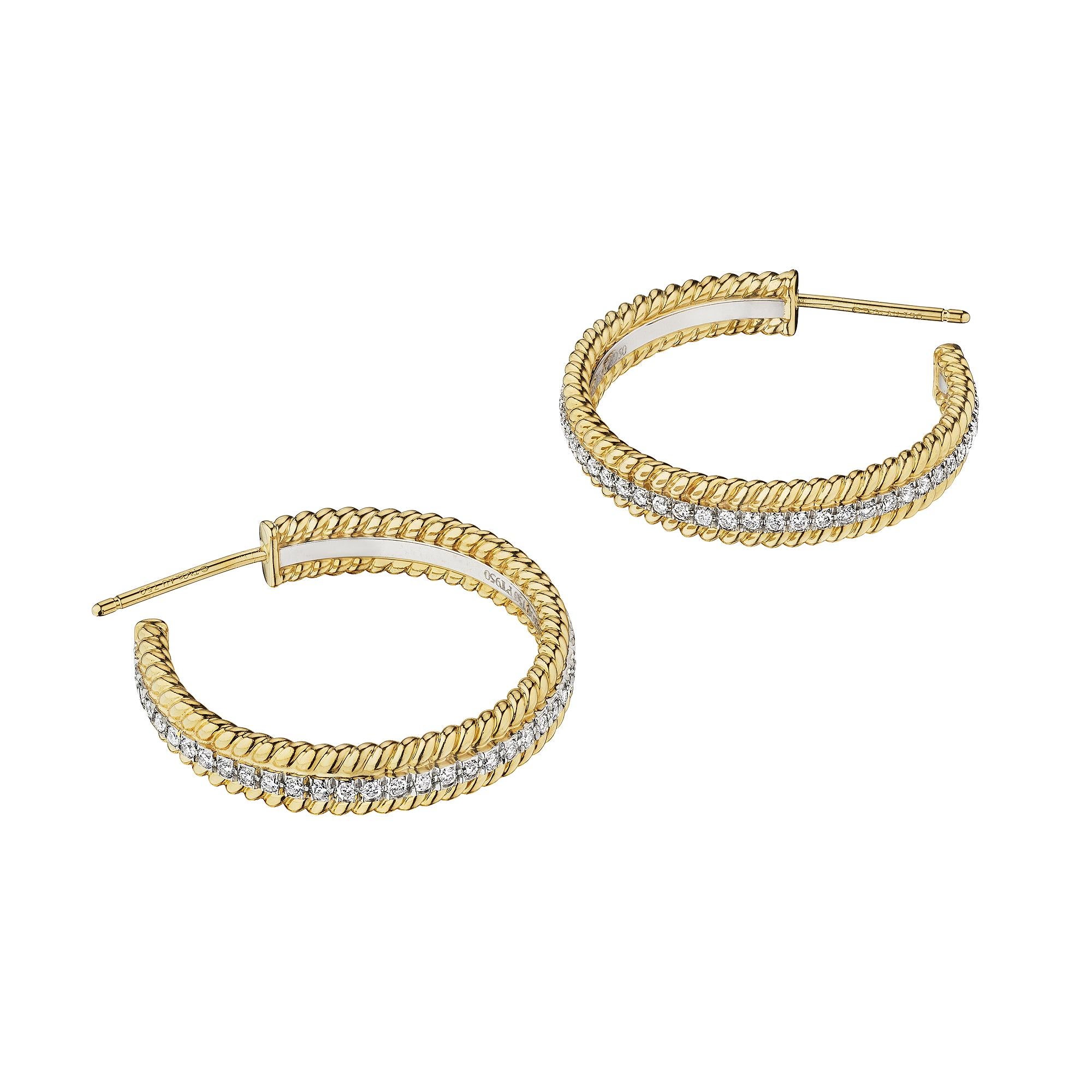 Circle yourself with these Jean Schlumberger Tiffany & Co. modernist diamond gold platinum hoop earrings.  With a row of round brilliant cut diamonds, surrounded by twisted 18 karat yellow gold ropes, these dazzling earrings are a wardrobe must