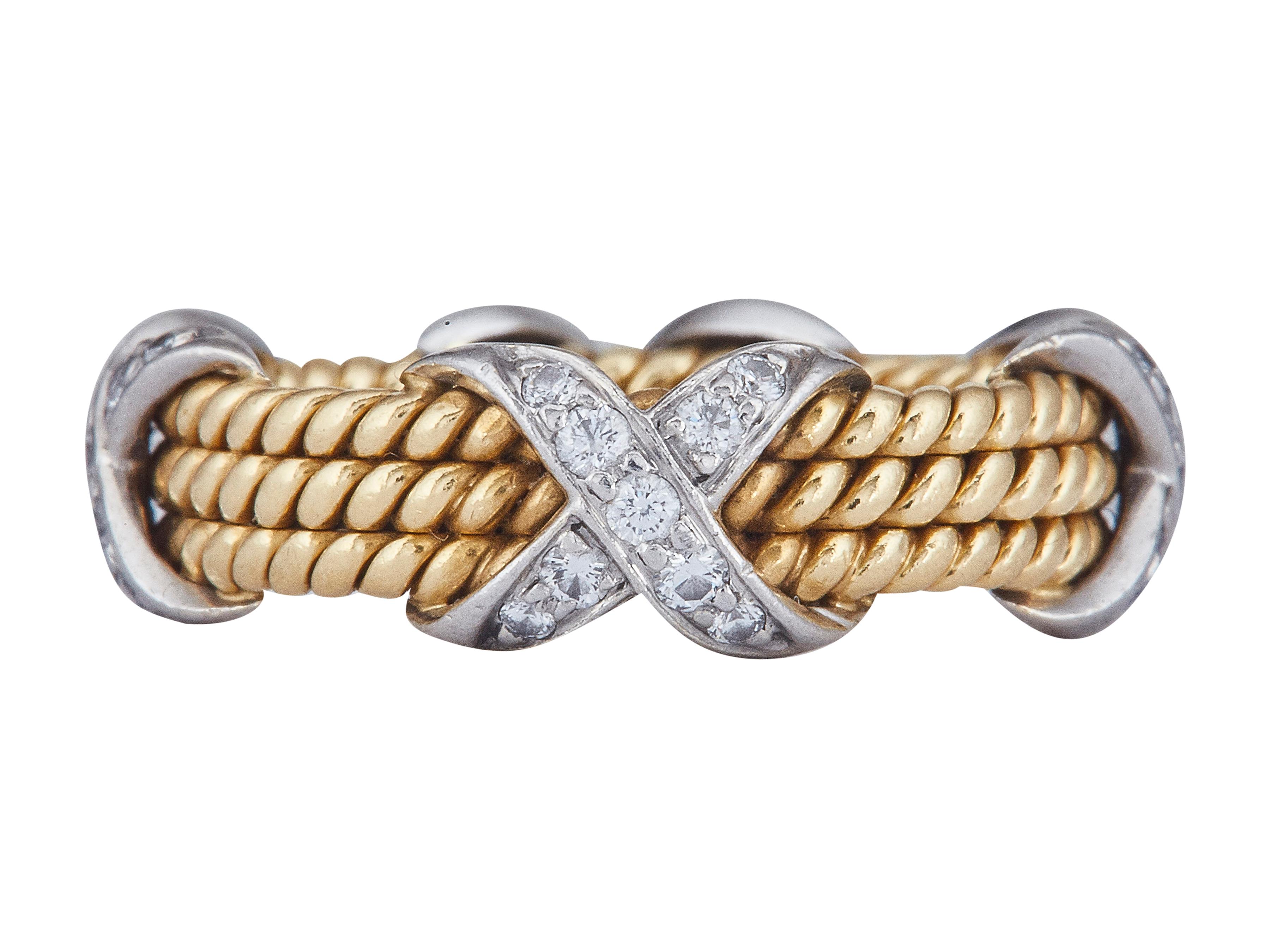 Jean Schlumberger for Tiffany & Co. Anello Tiffany The Row a tre file X in oro giallo 18K

Jean Schlumberger era un artista francese autodidatta e vicepresidente di Tiffany & Co. celebre per aver elevato i gioielli ad arte scultorea. Lavorando dal