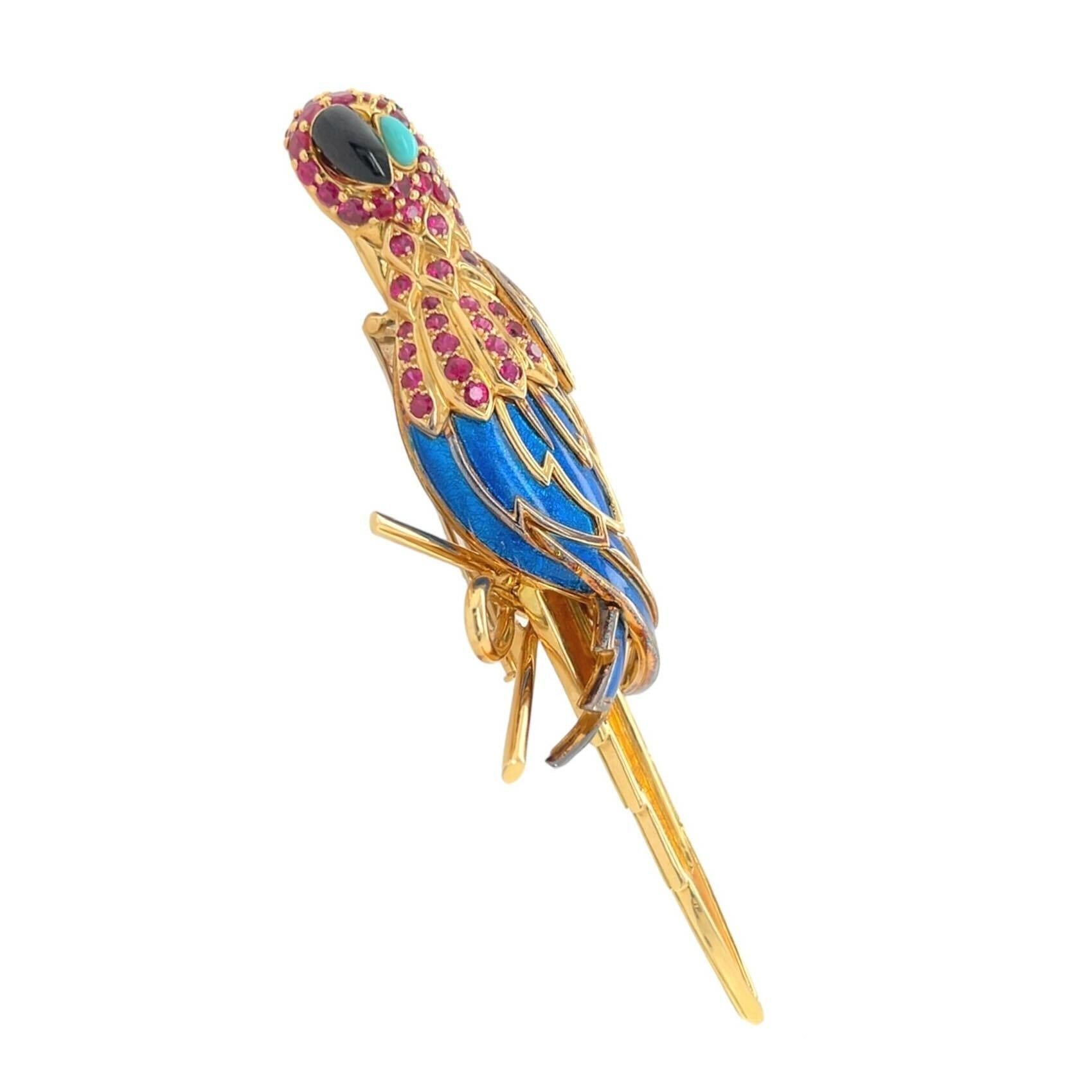  An 18 karat yellow gold, ruby, turquoise, emerald and enamel brooch, Jean Schlumberger, Tiffany & Co., France.  Designed as a parrot, its head set with approximately ninety three (93) round faceted rubies weighing approximately 10.71 carats total