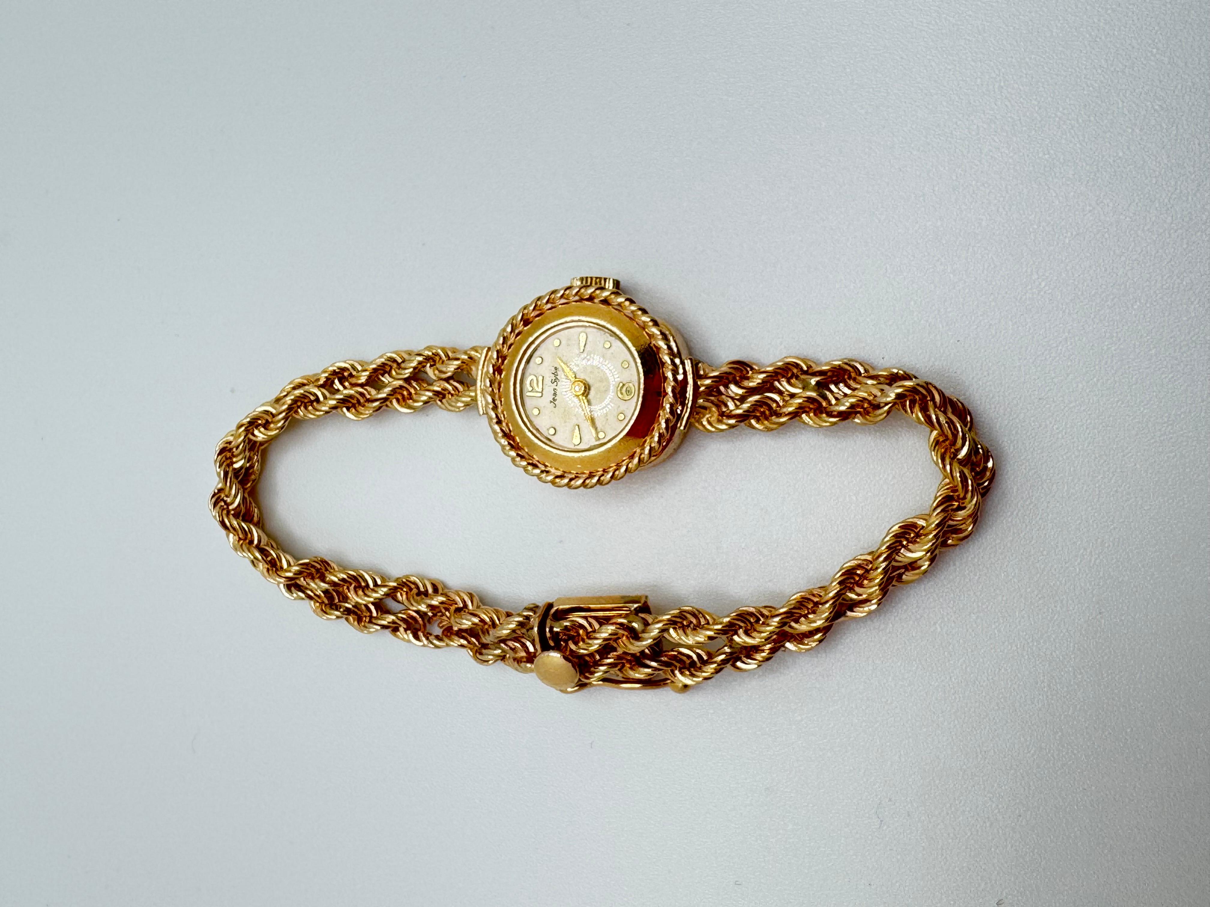 Elegant Jean Sybe women's wristwatch crafted in solid 14K yellow gold. This timeless piece features a double rope chain design, with each chain measuring 3.0mm, offering a refined and classic look. The bezel continues the rope motif, framing a soft