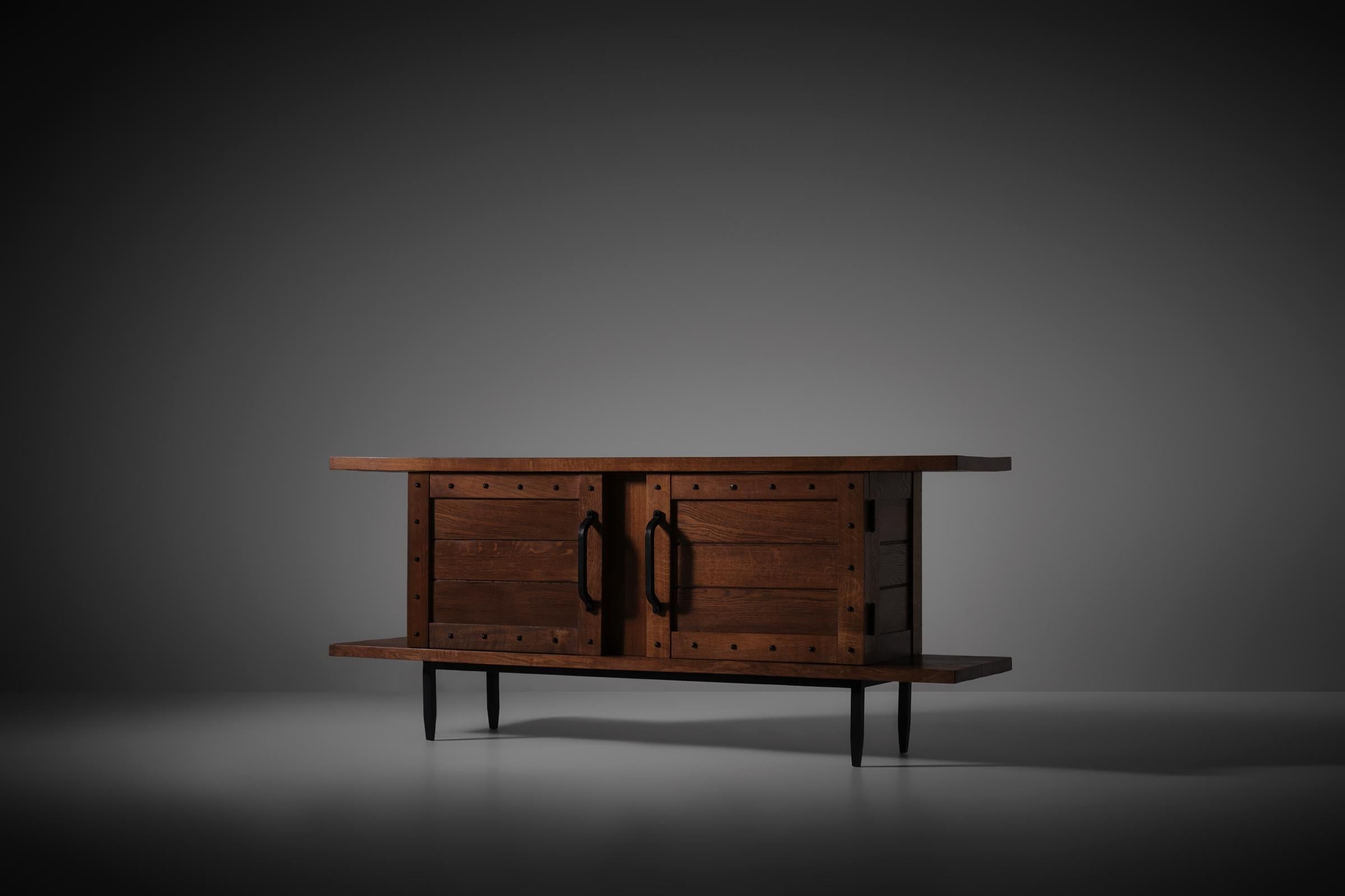 French Jean Touret & Les Artisans de Marolles sideboard in solid Oak and wrought Iron For Sale