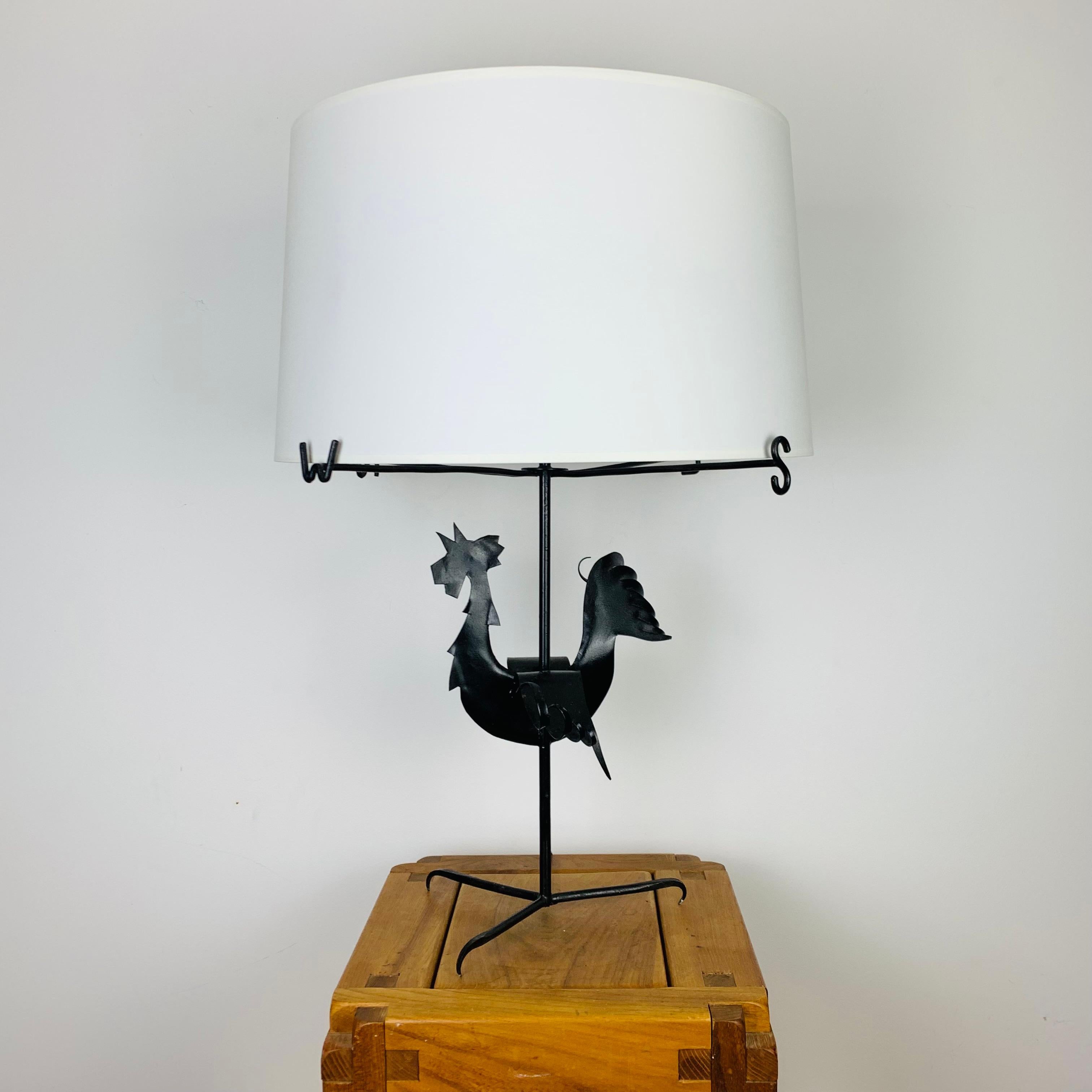 French work from the 1950's, in the manner of Jean Touret and Marolles artisans. The iron has patina.

Original french old electrification, new lampshade. 