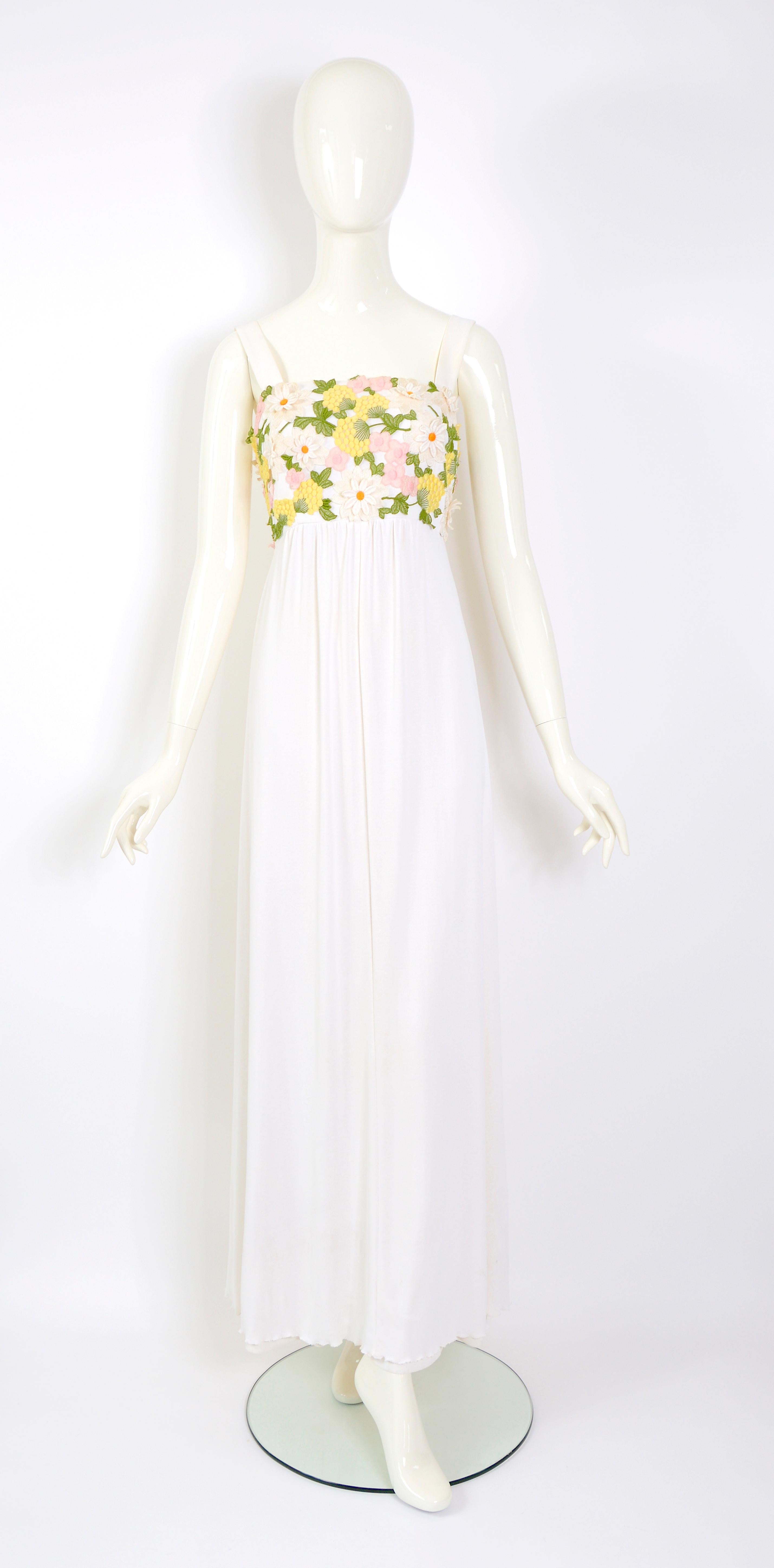Beautiful dress attributed to Jean Varon. 
Made in the softest and most luxurious-feeling silk jersey, maybe a mix, but definitely silk. The dress is very nicely made and executed. You have two skirt layers.
This could be the garden or beach event