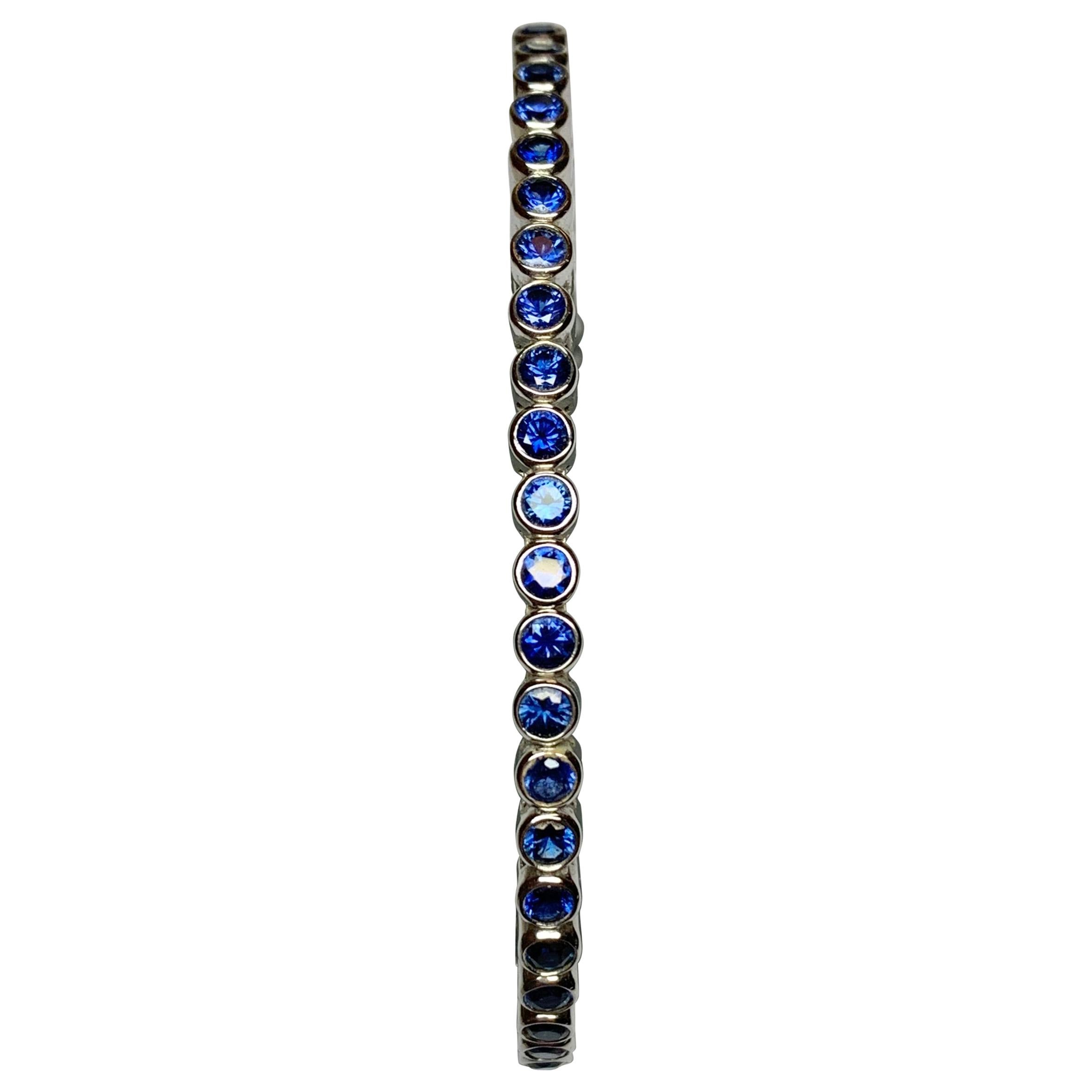Jean Vitau 18 Karat White Gold Blue Sapphire Spring Bangle Bracelet For Sale