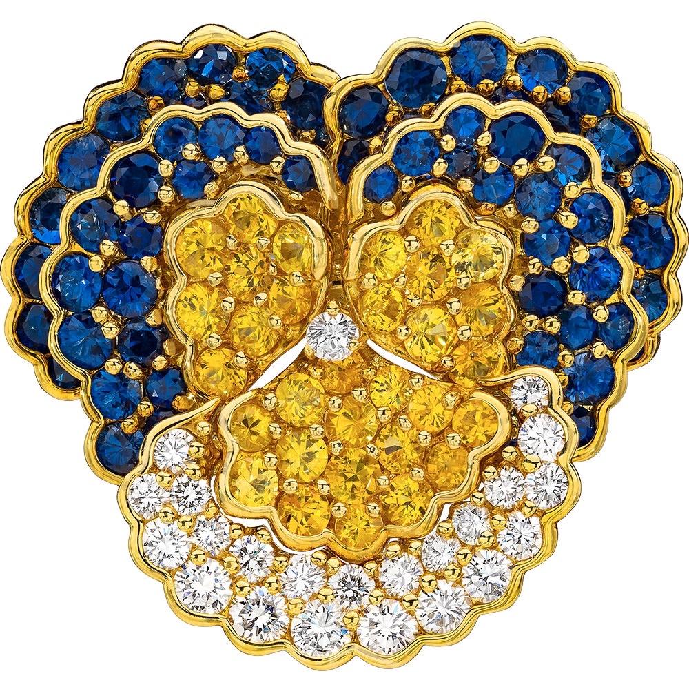 Designed by the famed French designer Jean Vitau for Gemveto.  Jean Vitau was a pioneer jewelry designer . He was known for patenting the Gemlok setting ,a secure and snag proof way of setting diamonds and colored stones.

This lovely pansy brooch