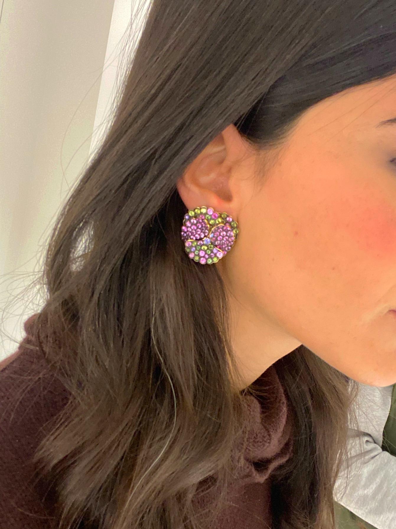 Designed by the famed French designer Jean Vitau for Gemveto. Jean Vitau was a pioneer jewelry designer . He was known for patenting the Gemlok setting ,a secure and snag proof way of setting diamonds and colored stones.

These lovely pansy earrings