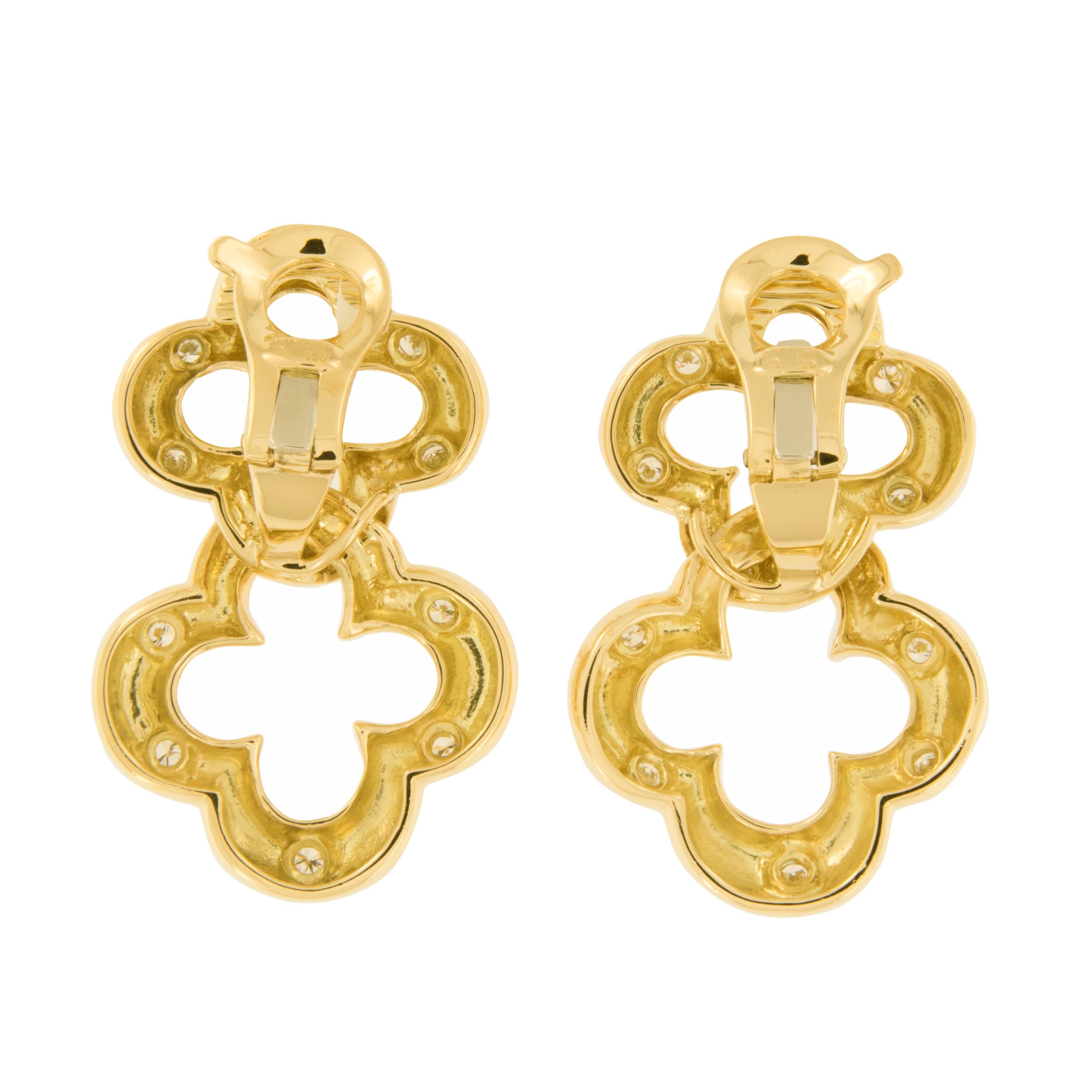 18k yellow gold and diamond Double Clover drop earrings made by Jean Vitau. These exceptionally executed clip-on style earrings are beautifully accented with 0.80 cttw of F-G VS diamonds. Hand made in New York, USA

This piece is copyrighted and