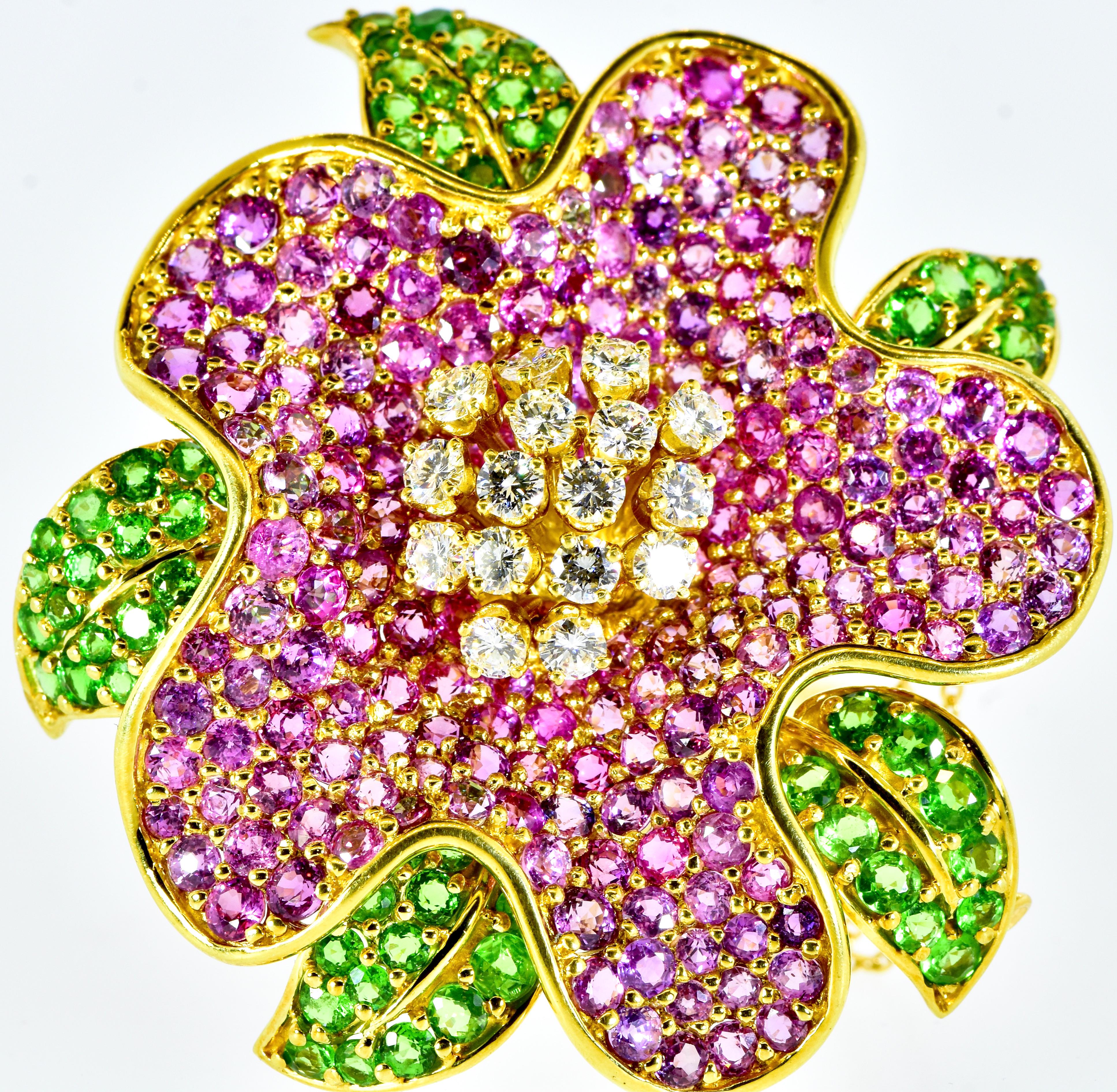 Jean Vitau pin and pendant of a large exotic flower.  Jean Vitau began designing jewelry in the last quarter of the 20th century in Paris. He moved to New York and became a leader in jewelry design. He worked for Tiffany and also designed pieces