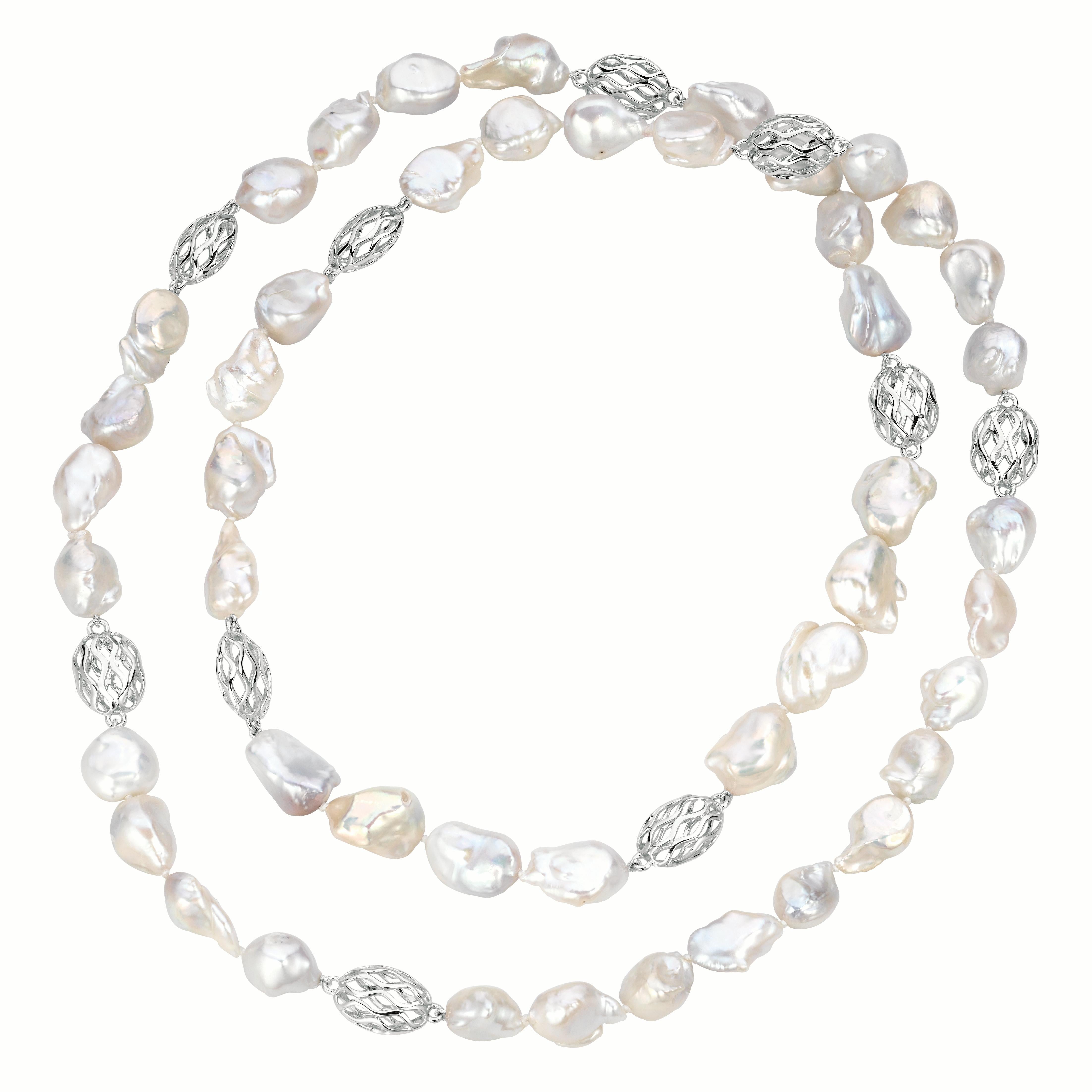 These gorgeous Baroque pearls lend themselves to be worn in a multitude of styles, long, doubled or lariat style. The design of the 18 karat white gold elements adds extra elegance to the piece. The beautiful luster of the pearls and the unique