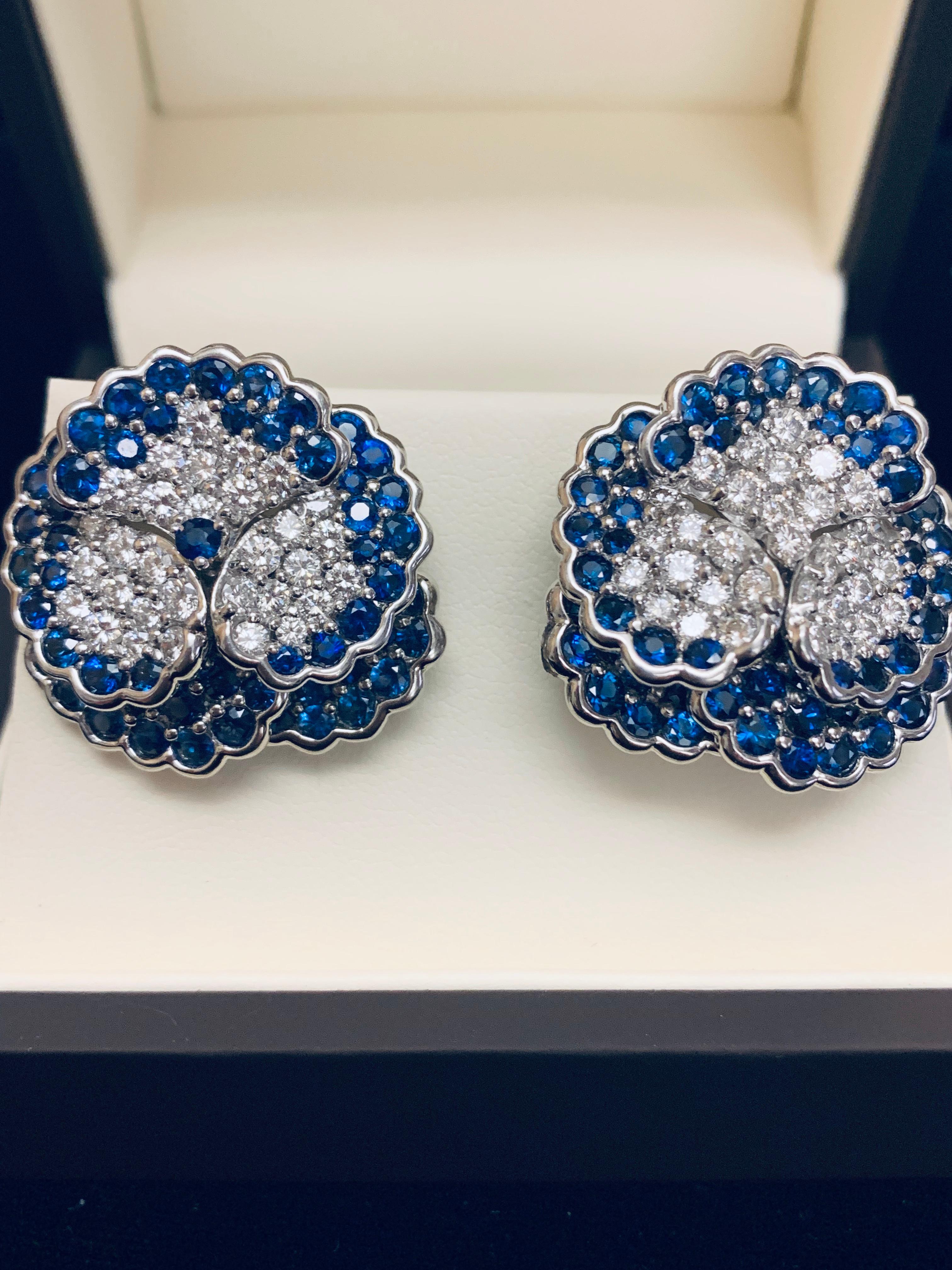 Jean Vitau loved the Pansy flower. He created brooches, earrings & necklaces using this beautiful flower. These gorgeous cornflower Blue Sapphire and G+ color & VVS clarity earrings with one having a sapphire in the center and the other with a