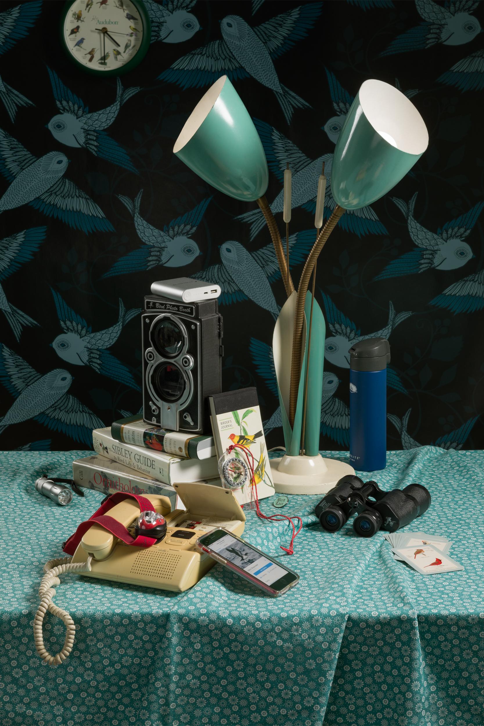 Jeanette May Still-Life Print - “Still Life with Binoculars” Vintage Tech Photograph about Bird Watching