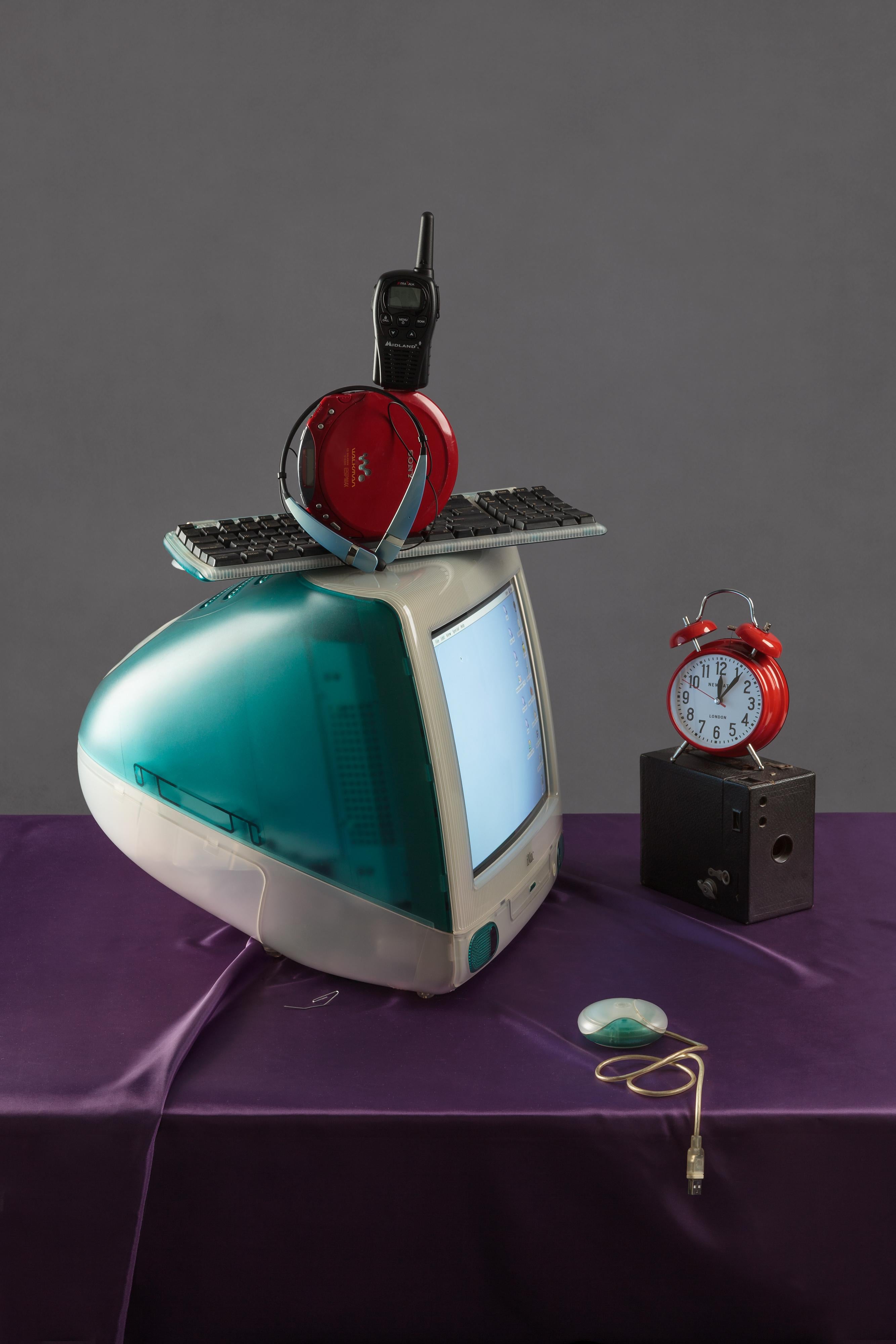 Jeanette May Still-Life Photograph - "Tech Vanitas: Blue iMac" Contemporary Still-life Photograph of Vintage Tech