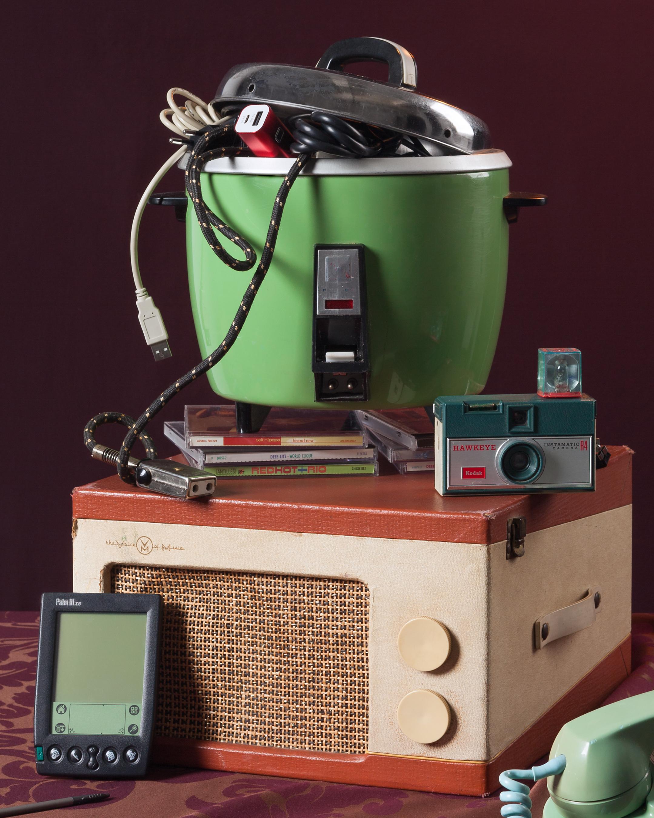 “Green Instamatic,” from my “Tech Vanitas” photography series, embraces our love for beautifully designed, vintage items and anxiety over new technology. My still lifes clearly reference 17th Century Dutch vanitas paintings and their air of craft