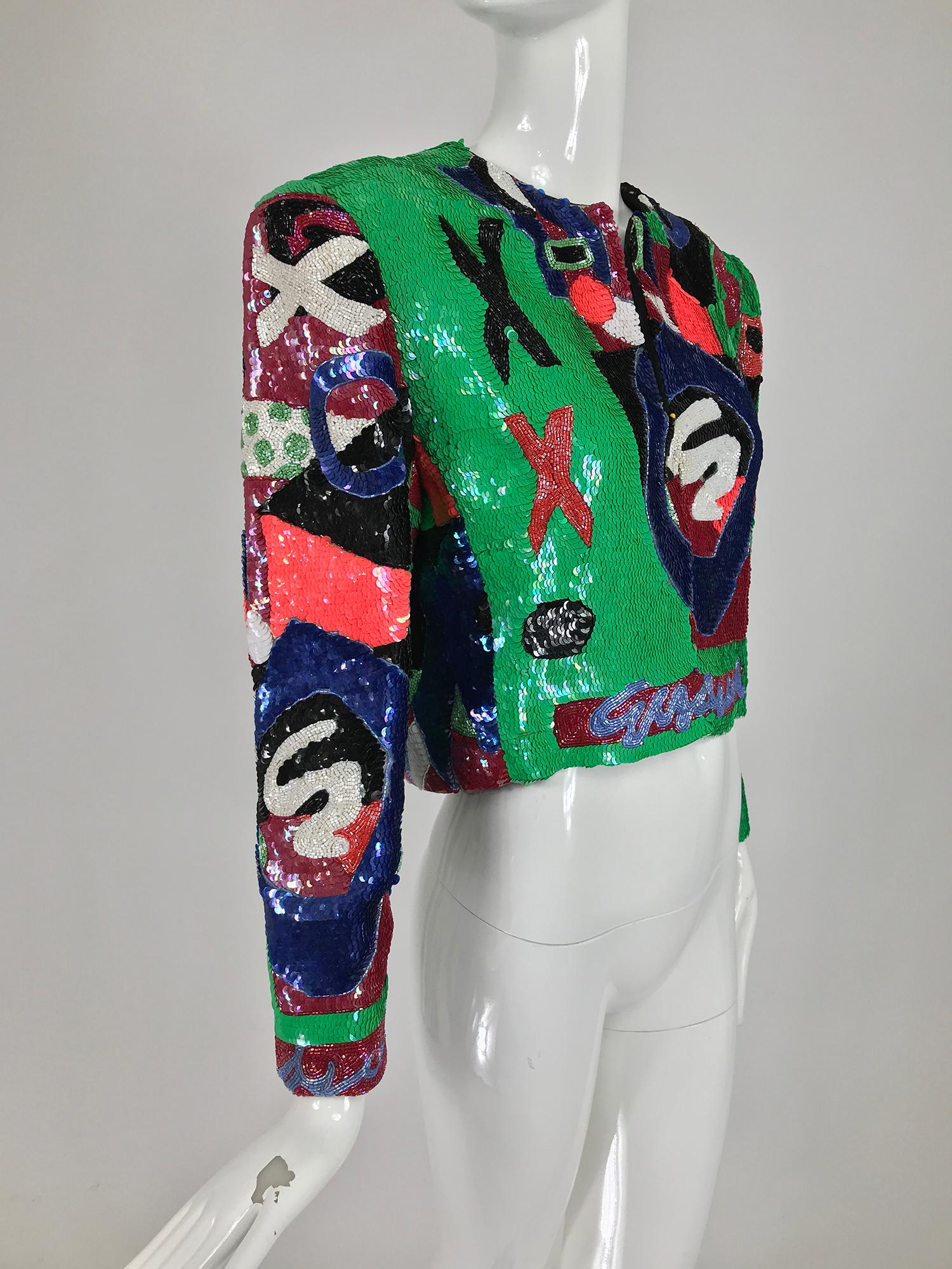 Jeanette St. Martin Beaded Art Sequin Jacket from the 1980s. Looks like a modernist painting, sort of reminds me of Niki de Saint Phalle! This amazing jacket is completely covered in bright coloured sequins in modernist design. The open front