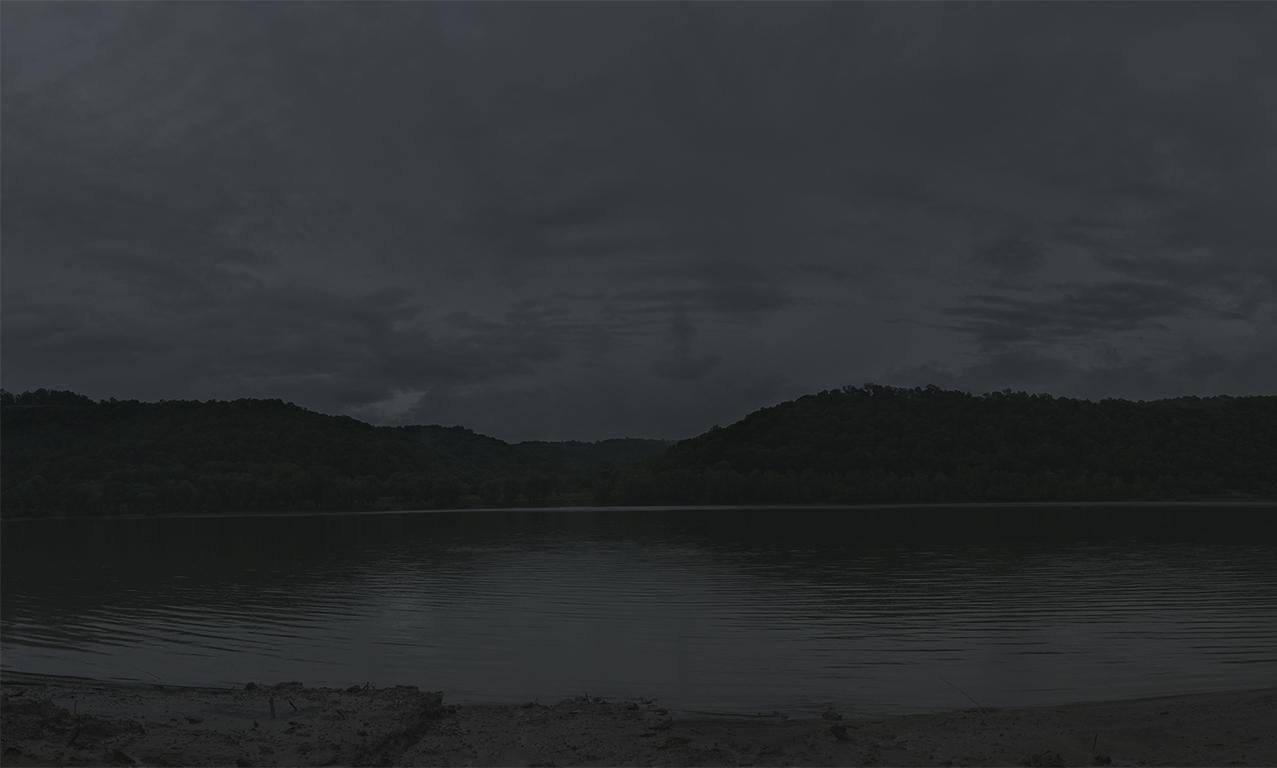 The River Jordan. First view of a free state, crossing the Ohio River to Indiana by Jeanine Michna-Bales is a panoramic photograph of a river taken at night. This photograph is from the series: Through Darkness to Light: Photographs Along the