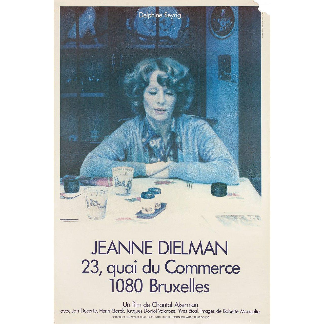 Original 1975 French half grande poster for the film Jeanne Dielman, 23, Quai du Commerce 1080 Bruxelles directed by Chantal Akerman with Delphine Seyrig / Jan Decorte / Henri Storck / Jacques Doniol-Valcroze. Very Good condition, rolled w/ missing