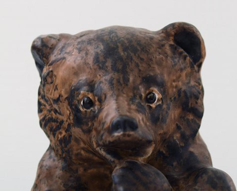 Danish Jeanne Grut for Royal Copenhagen Aluminia Faience, Sitting Bear Cub