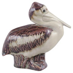 Jeanne Grut for Royal Copenhagen, ceramic pelican figurine. Mid-20th C.