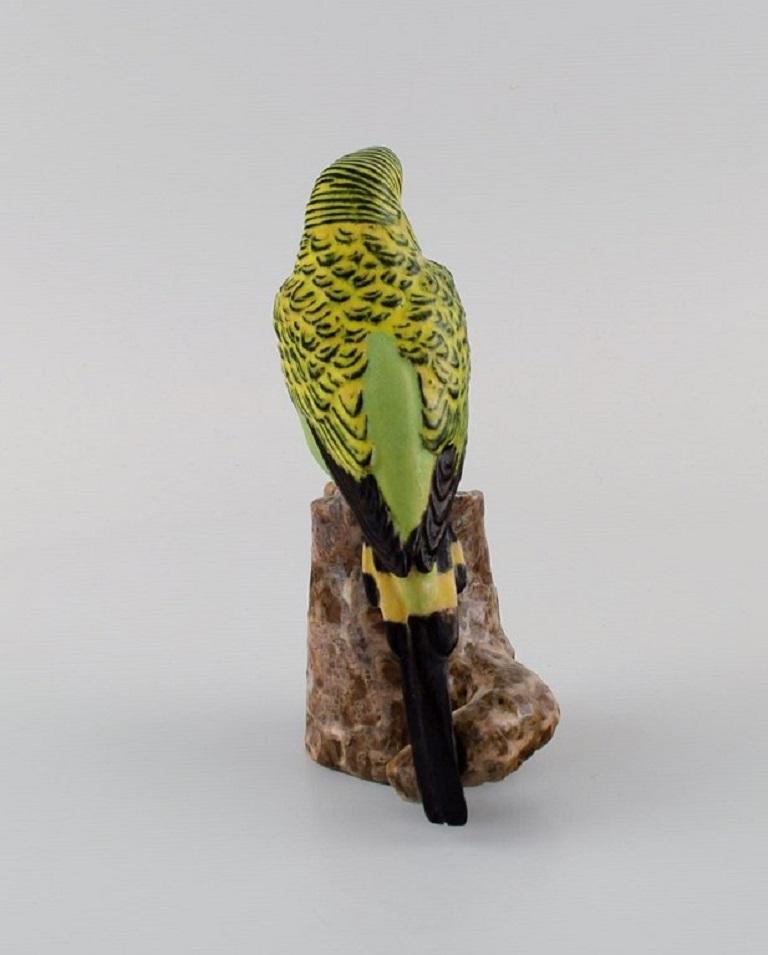 Late 20th Century Jeanne Grut for Royal Copenhagen, Figure in Hand-Painted Faience, Budgerigar For Sale