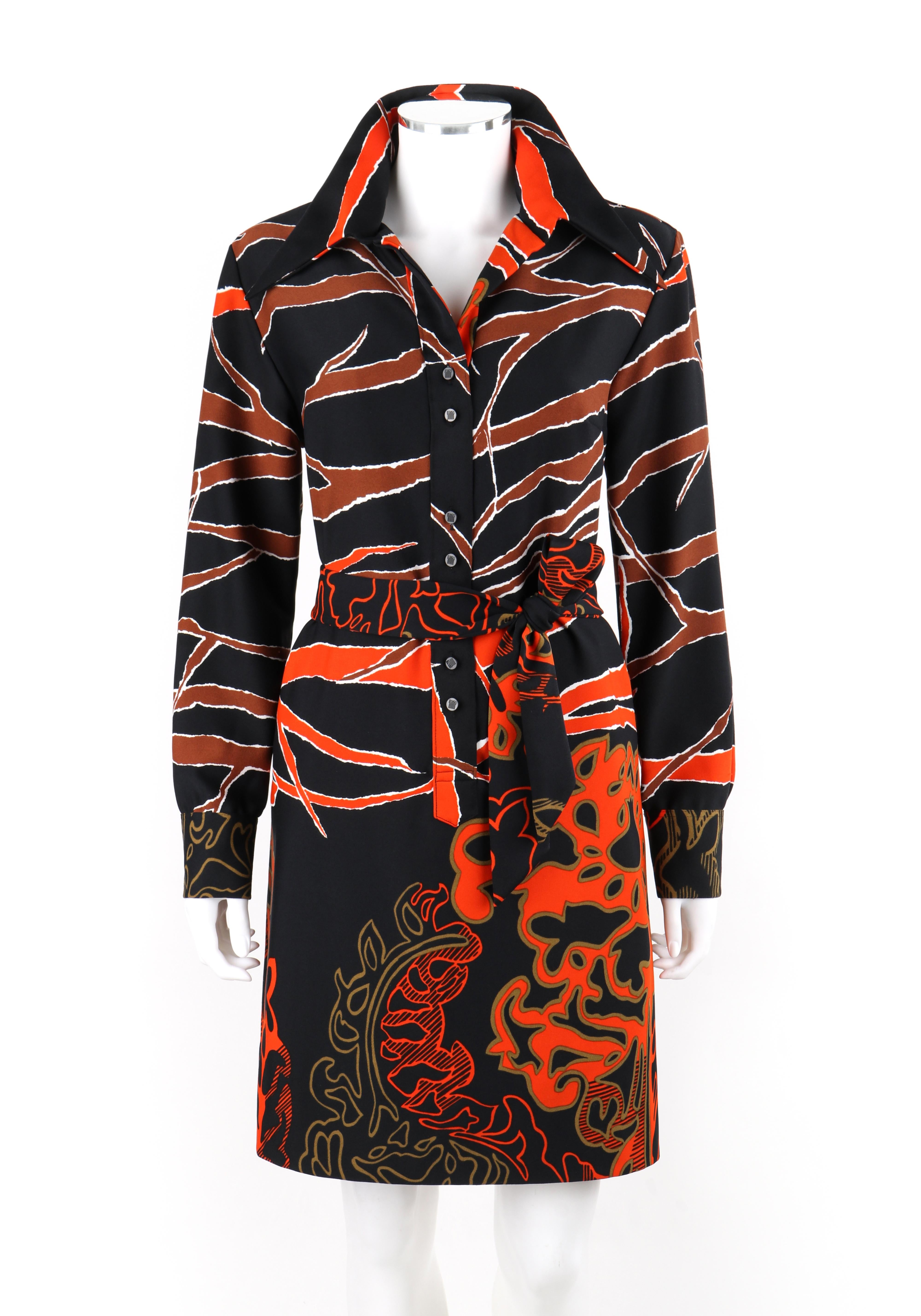 Brand / Manufacturer: Jeanne Lanvin
Circa: 1960s 
Designer: Jeanne Lanvin 
Style: Shirt Dress
Color(s): Shades of blue, orange, brown, white, gold
Lined: No
Unmarked Fabric Content (feel of): Rayon (primary material)
Additional Details / Inclusions: