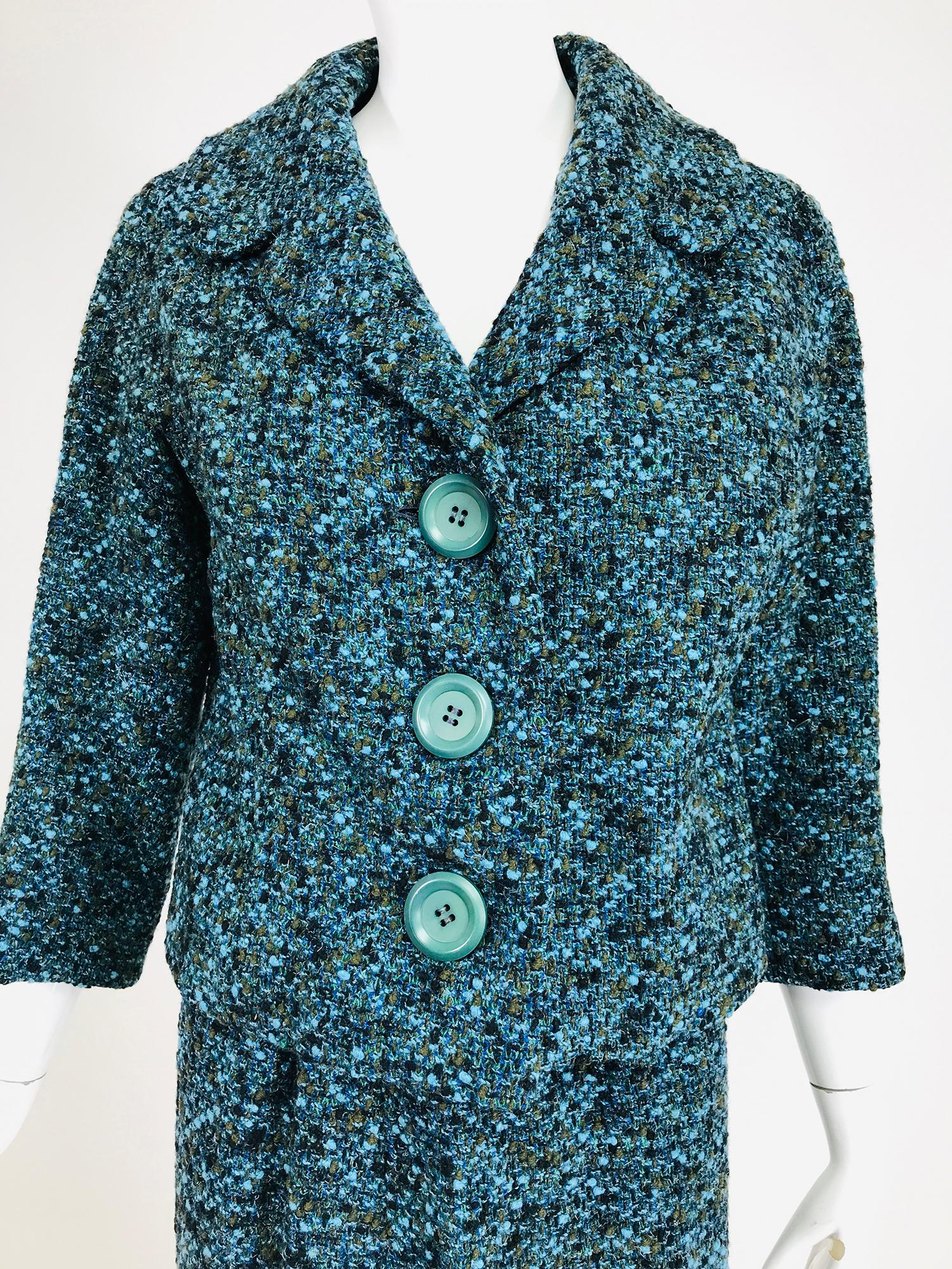 Jeanne Lanvin numbered couture, early 1960s designed by Jules-Francois Crahay. Aqua blue nubby wool tweed skirt suit, speckled wool in aqua blue, loden green & black. The jacket has a v neckline with curved notched lapels, cropped and boxy, it