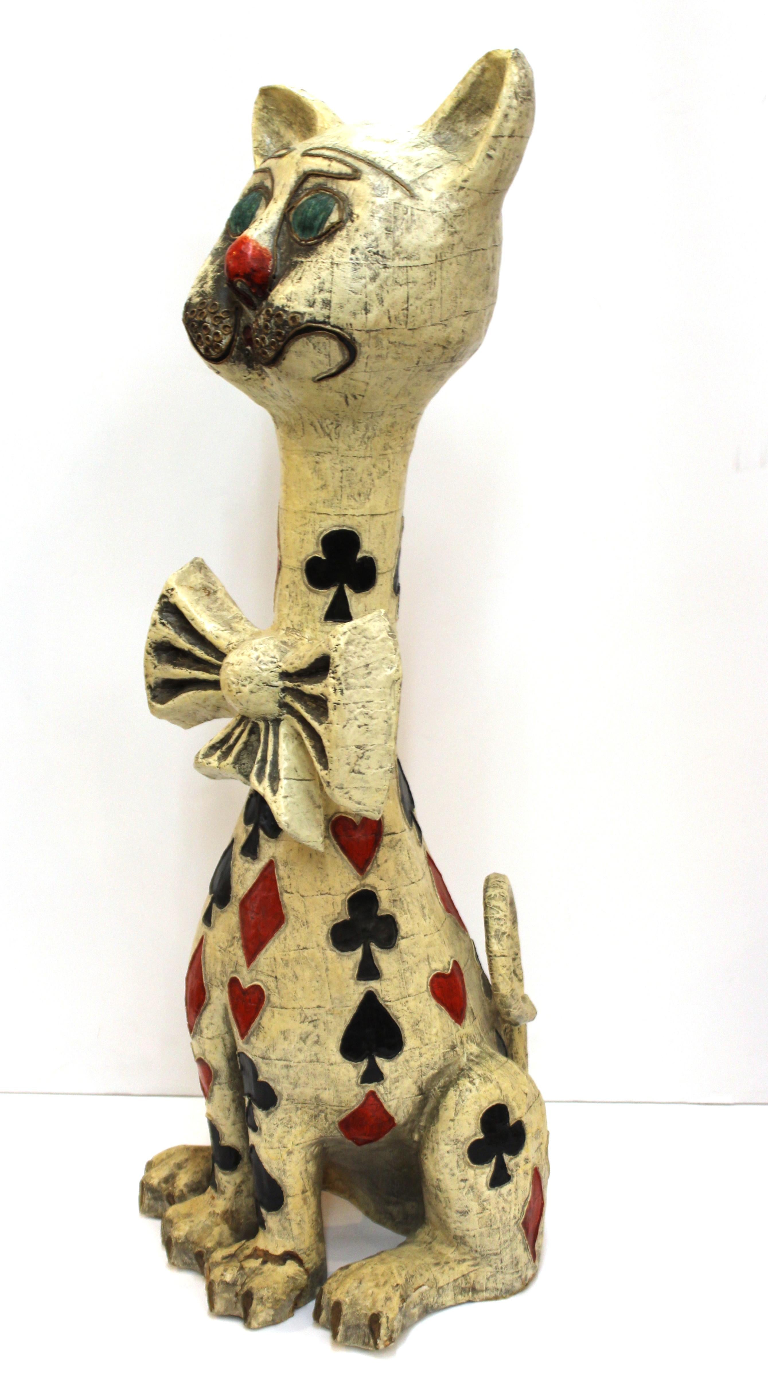 Mid-Century Modern large papier-mâché cat made by Mexican artist Jeanne Valentine. The piece is decorated with card motifs including hearts, diamonds, clubs and spades. Made during the 1970s, the piece is in great vintage condition with some minor