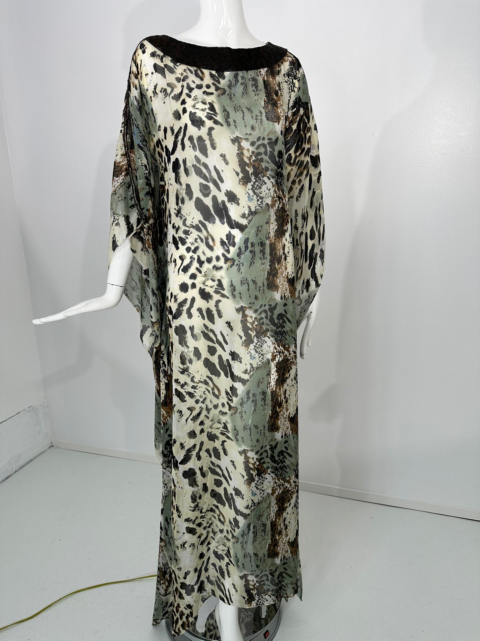 Jeannie McQueeny leopard print beaded sheer silk chiffon OSFM. Gorgeous copper beaded neckline and shoulder top, this caftan has a dramatic print done in cream, dark brown & lichen green. Long and flowing perfect for at home entertaining. There are