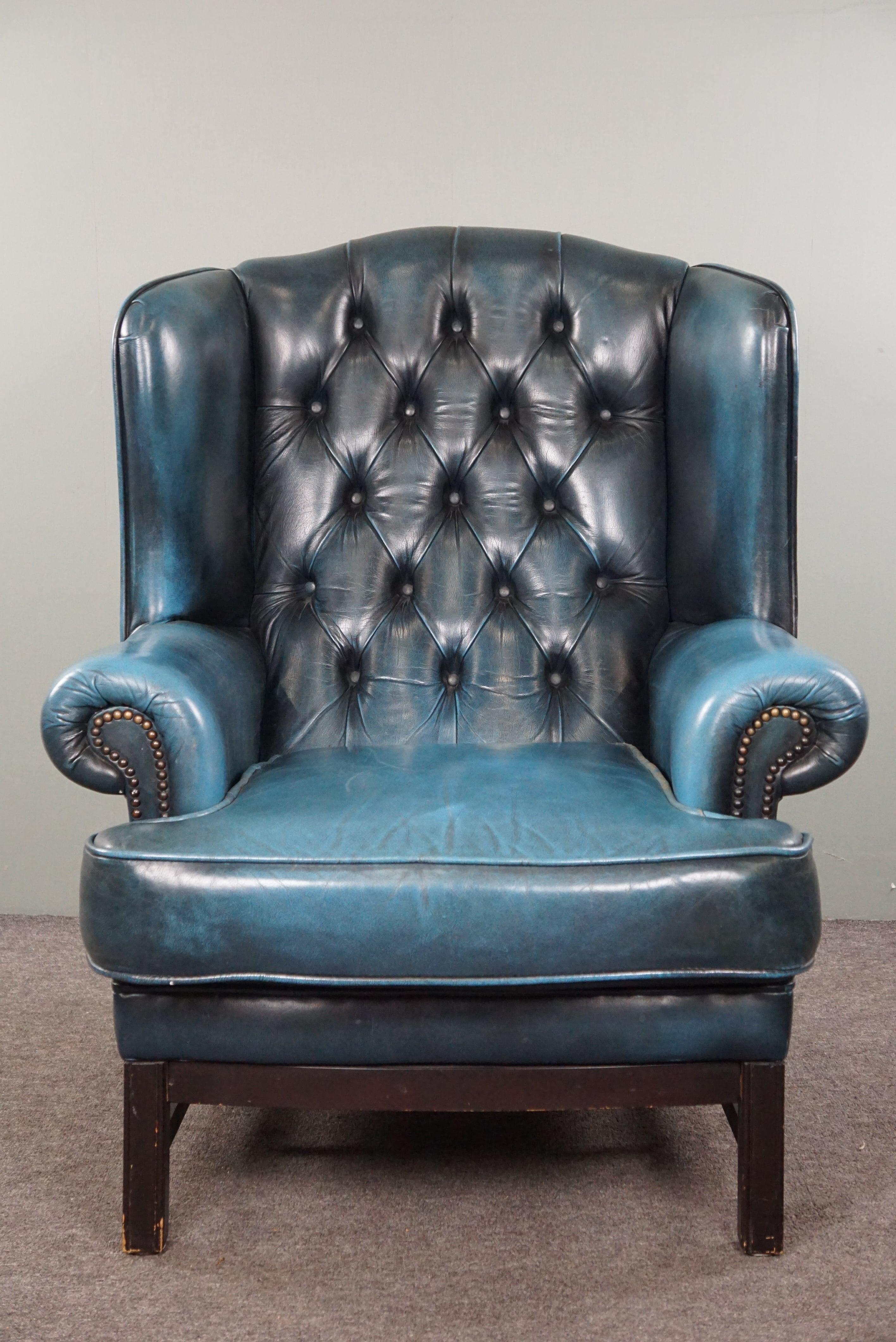 Jeans blue leather English Chesterfield wingback armchair with ottoman