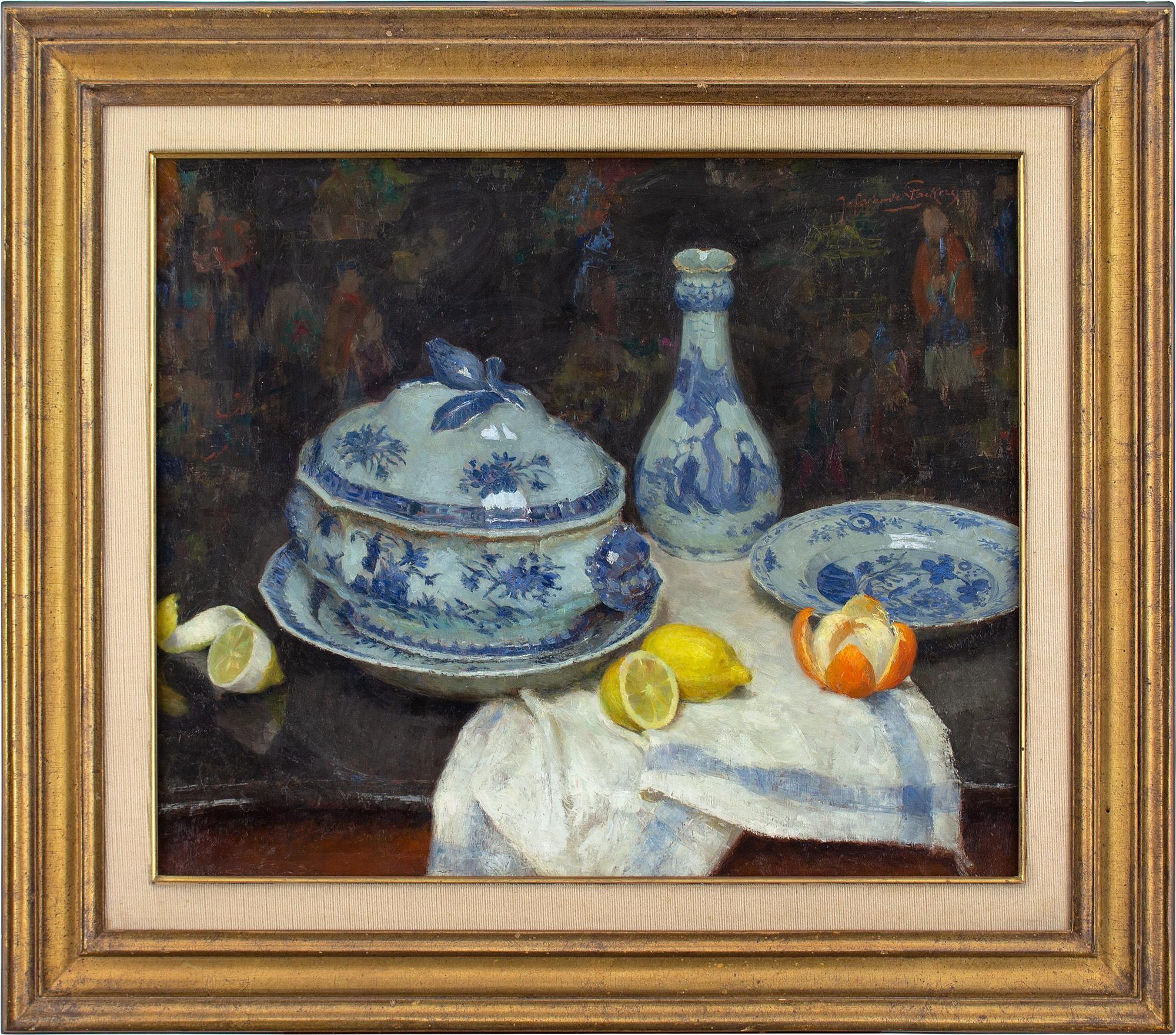 This fine mid-20th-century oil painting by Belgian artist Jef Van de Fackere (1879-1946) depicts a still life with blue and white ceramics, lemons and orange.

Van de Fackere was a precocious talent who became a teacher at the Academy of Fine Arts