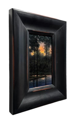 Arroyo - Sol poniente proyectando rayos naranjas sobre el lecho del arroyo, Pintura al óleo enmarcada