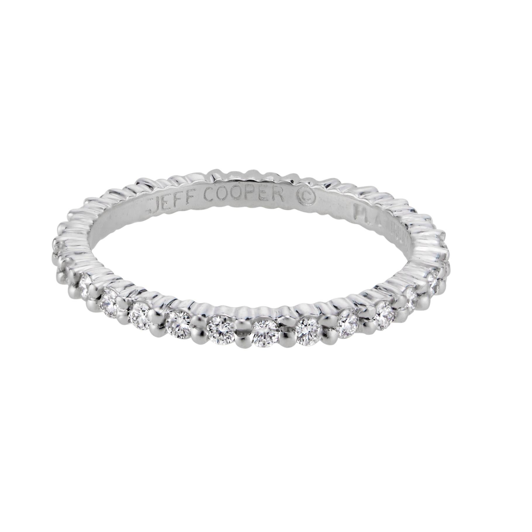 Diamond eternity wedding band ring. 29 round diamonds in common prong solid platinum setting. By Jeff Cooper

29 round brilliant cut diamonds, G VS approx. .55cts
Size 6 and not sizable
Platinum 
Stamped: Platinum 
Hallmark: Jeff Cooper
2.4 grams