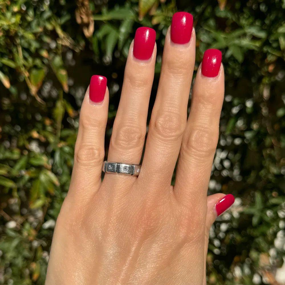 Modern Jeff Cooper Designer Princess Cut Diamond Platinum Eternity Band Ring For Sale