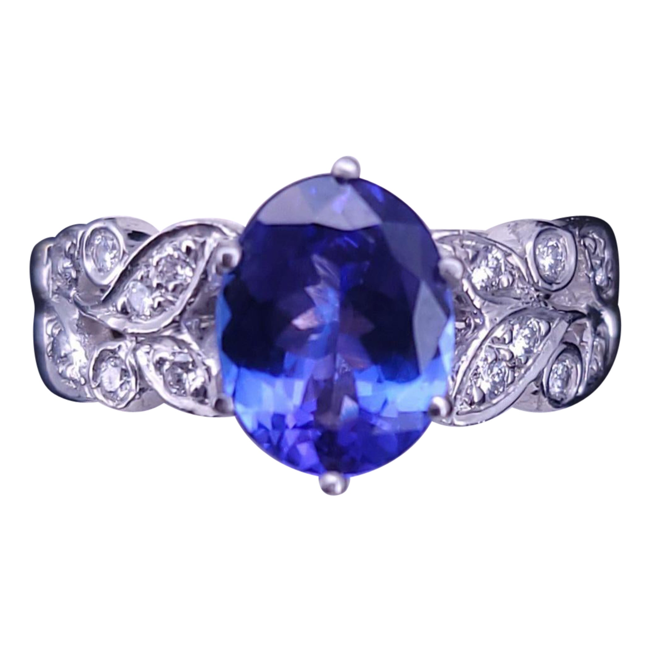 “Jeff Cooper Vintage Oval Tanzanite Diamond Ring in Two-Tone” For Sale
