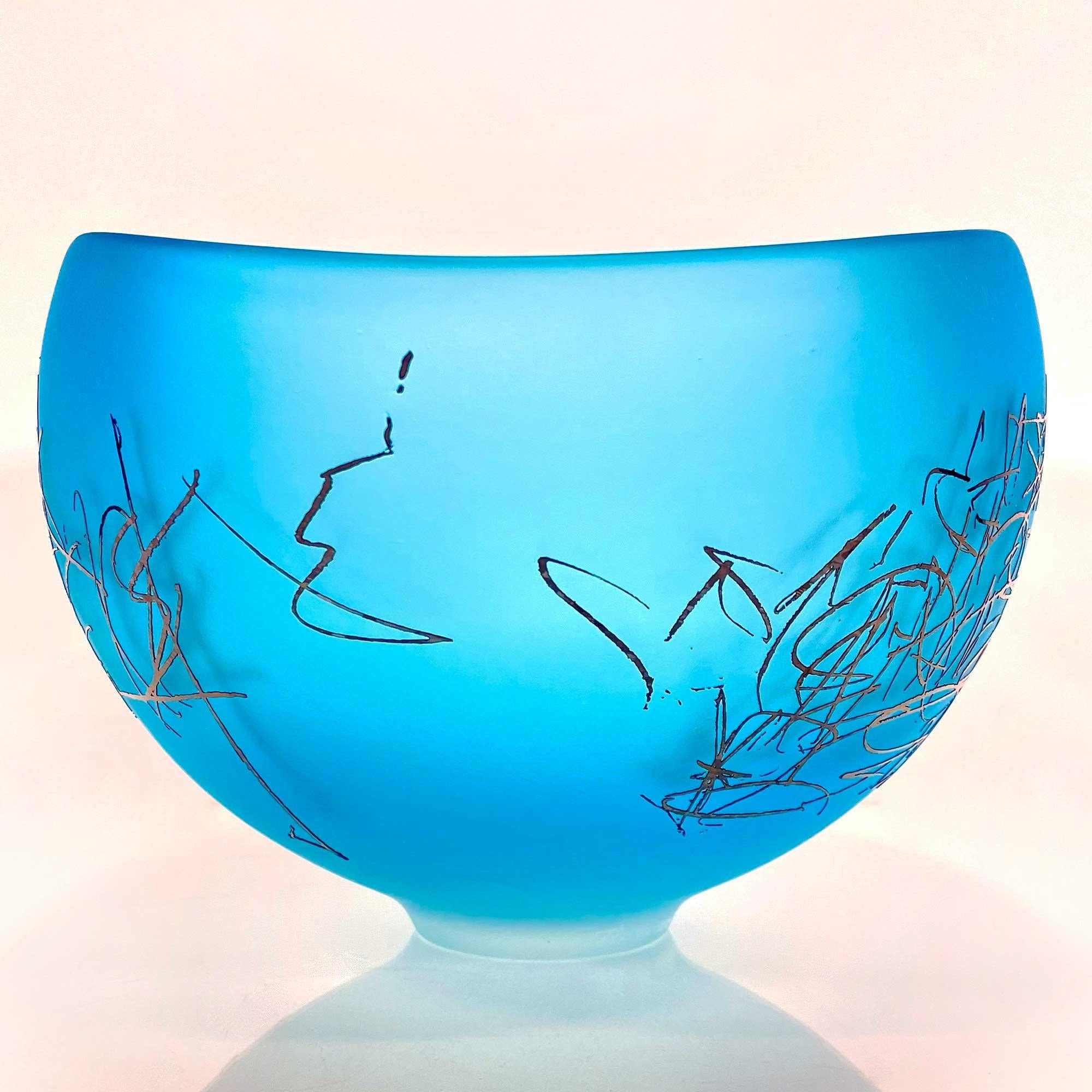 The Goodman Studio has garnered international recognition and admiration for the beauty and accomplishment of its modern blown glass vessels, sculptures and architectural glass. Every piece created is one-of-a-kind and made in their studio.

Jeff