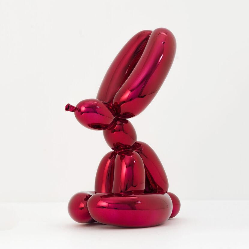 Created in 2019, Jeff Koons’ balloon animals are comprised of metallic porcelain with chromatic coating.  In terms of size, The Rabbit (Red) is 29.2 x 13.9 x 21.0 cm (11.5 x 5.4 x 8.2 in). The balloon animal series represents the ephemerality of
