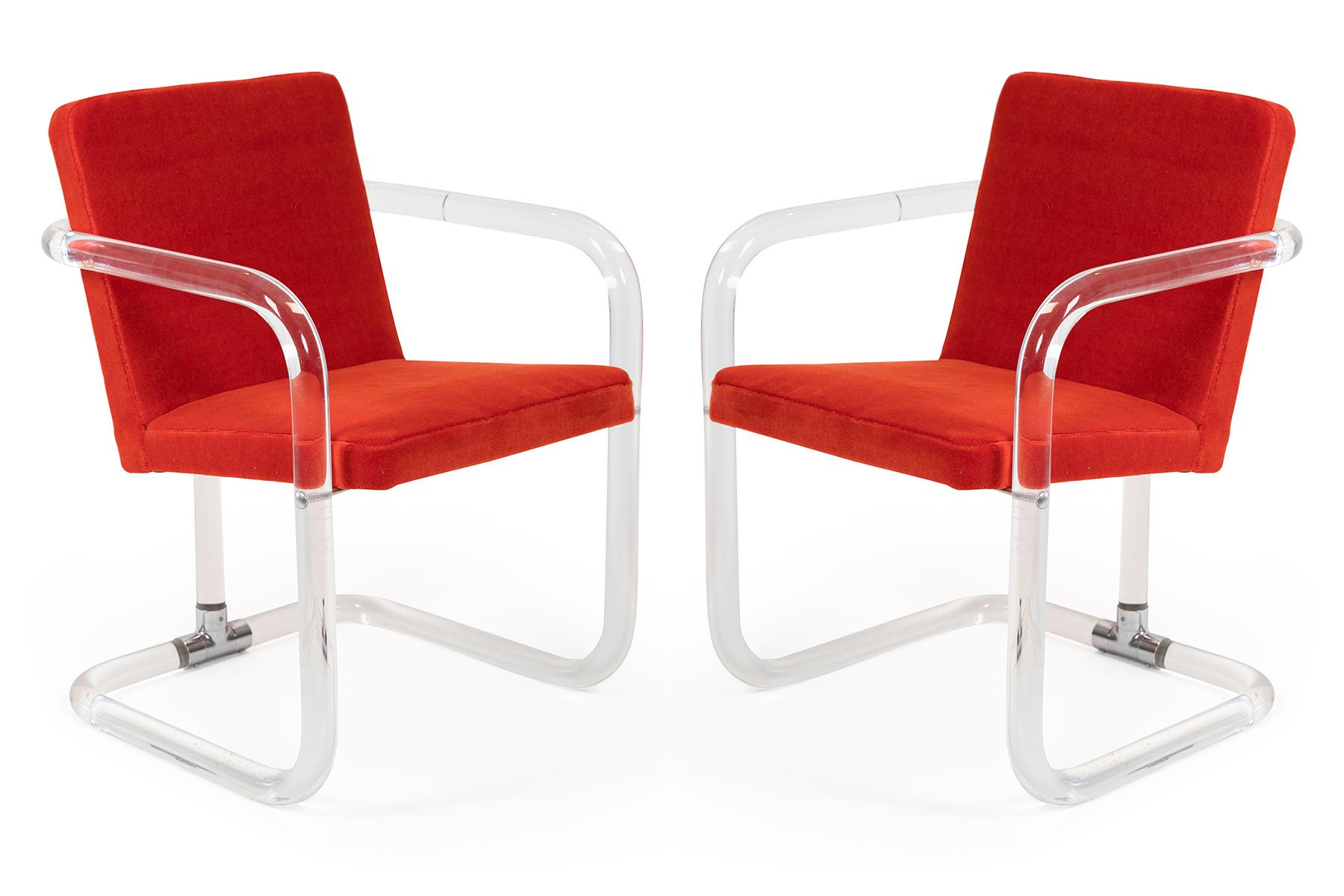 Pair of tubular lucite chairs by Jeff Messerschmidt, circa early 1970s. These examples have been newly upholstered in mohair. Price listed is for the pair.