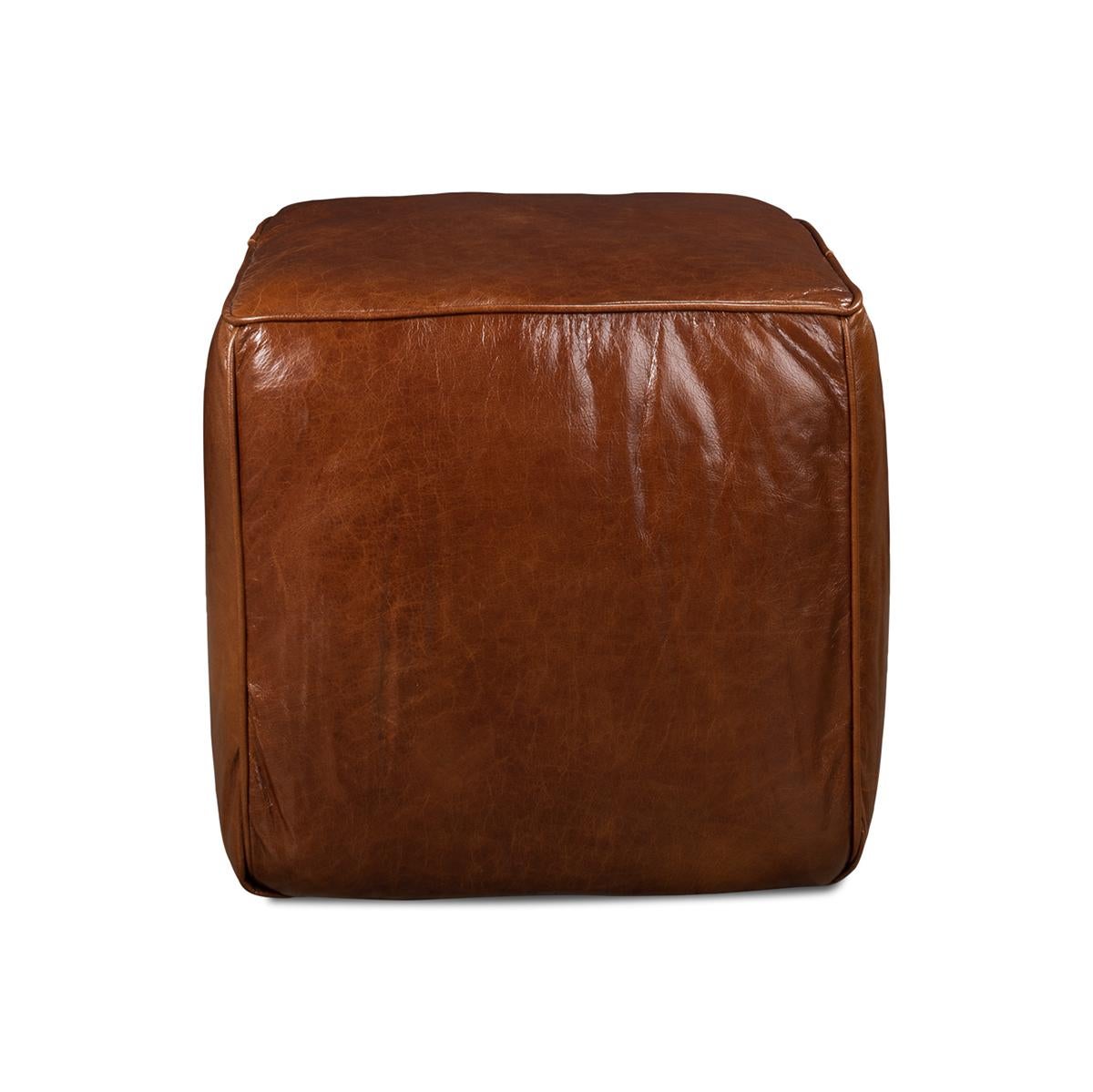  Ideal for modern, traditional, or even Western aesthetics, this cube is your go-to seating solution. The vintage brown leather adds character, making it a versatile piece that complements any decor. Transform your space with this adaptable and