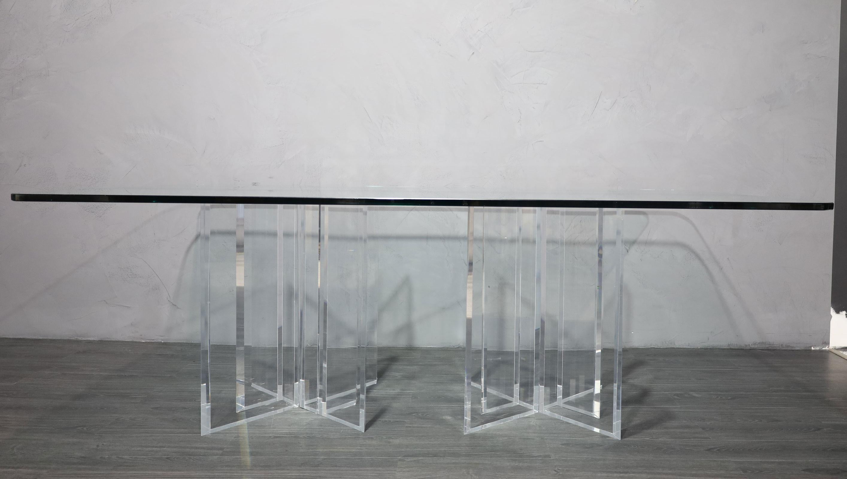 This lucite table is comprised of four pieces of 2