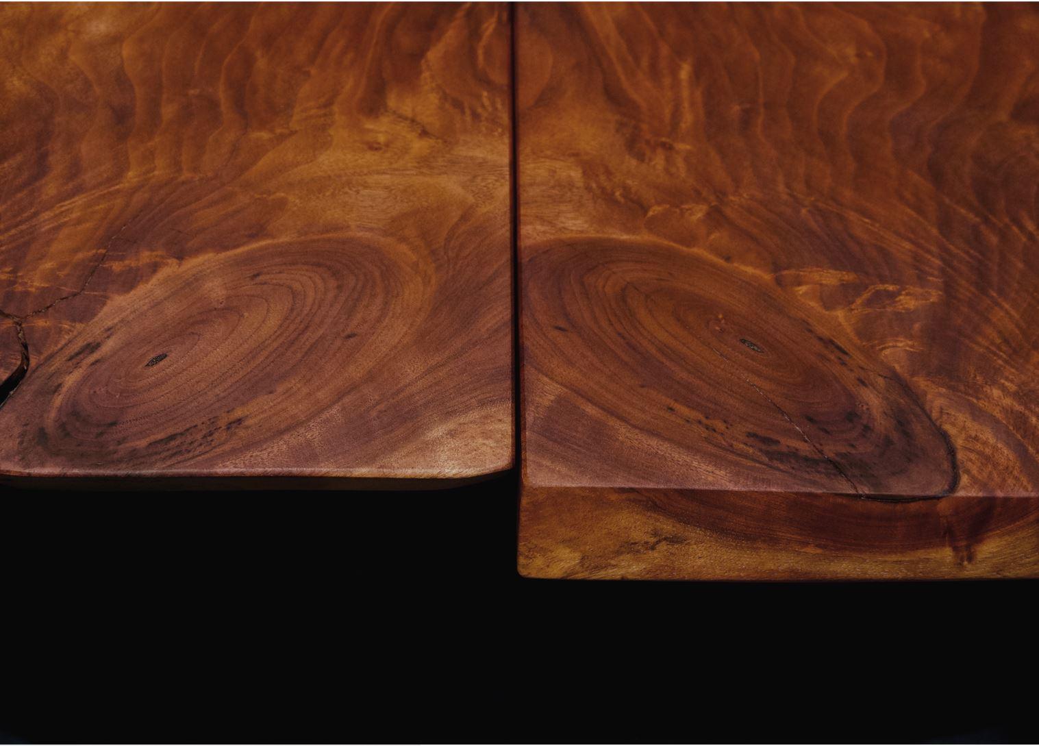 This delightful pair of Live Edge Black Walnut End Tables is available immediately. Each has a Live Edge Black Walnut Slab top and a solid Black Walnut cantilevered base. The Slabs are Book Matches; they can be placed end-to-end at the wide ends and