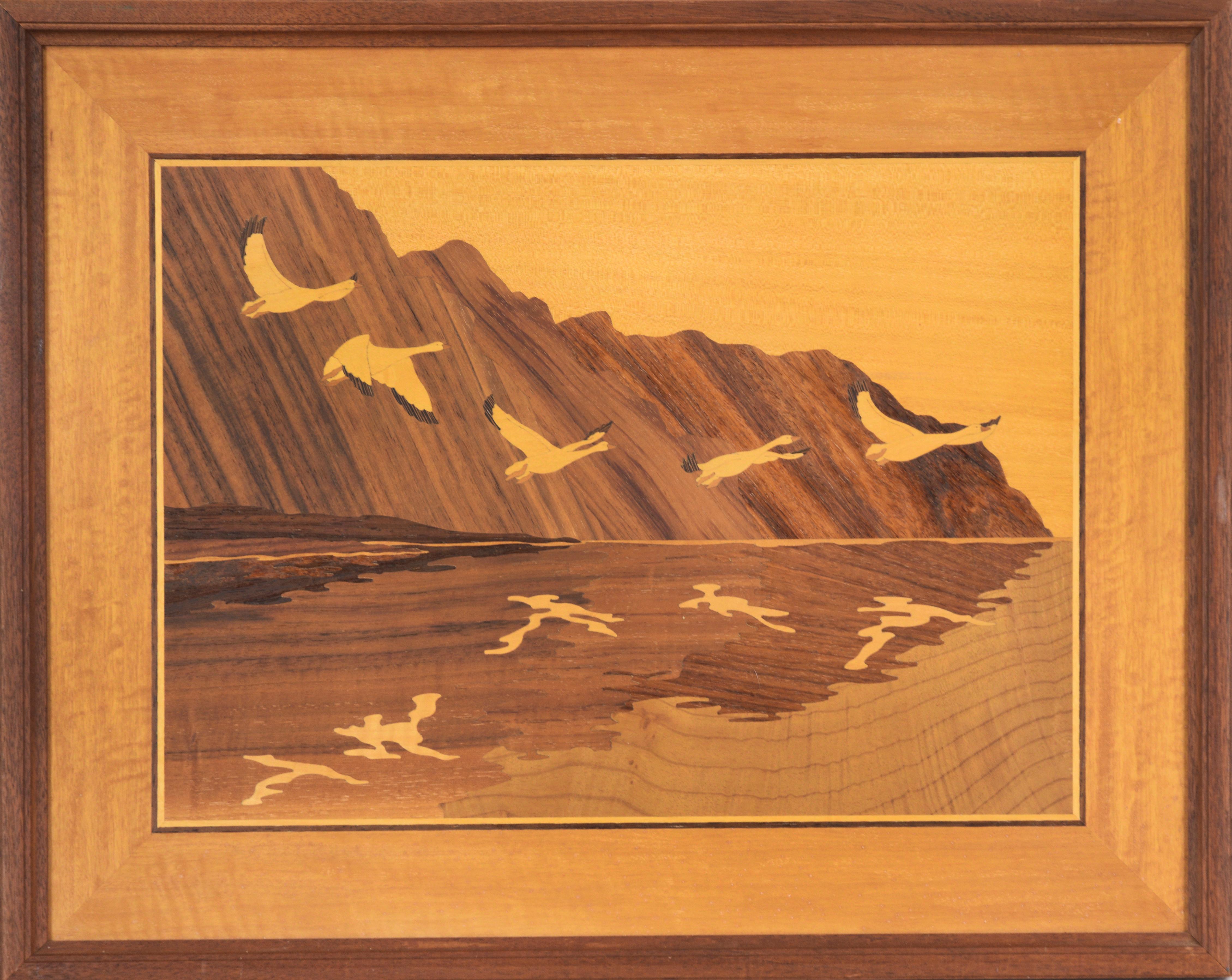 Hudson River Inlay Landscape Scene by Jeffrey Nelson
Hudson River Inlay Landscape Scene by Jeffrey Nelson (American, b. 1959-). Five Geese are seen flying over calm waters, their shadows appearing beneath them. Dark wood mountains are shown in the