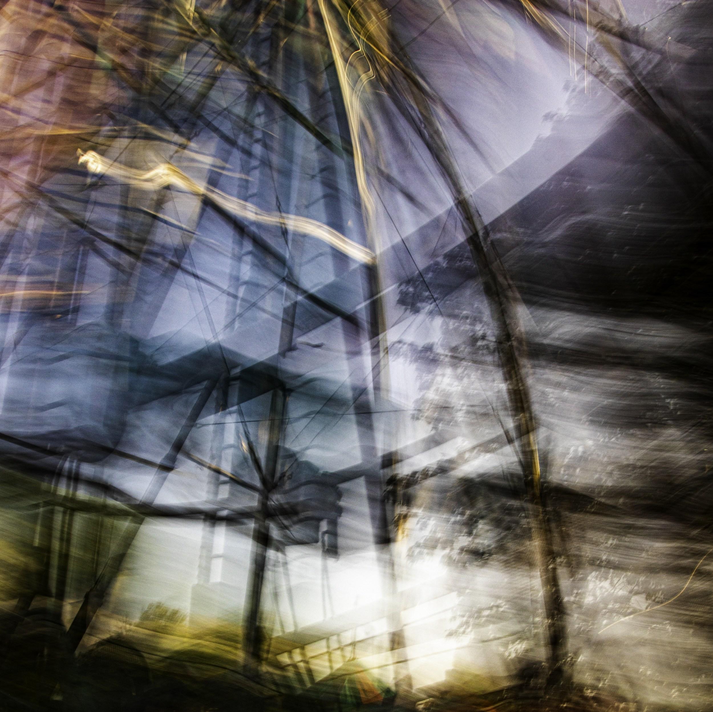 Jeffrey Tamblyn Abstract Photograph - Redemption and Retribution (Ferris wheel, motion blur, kinetic, fairgrounds)