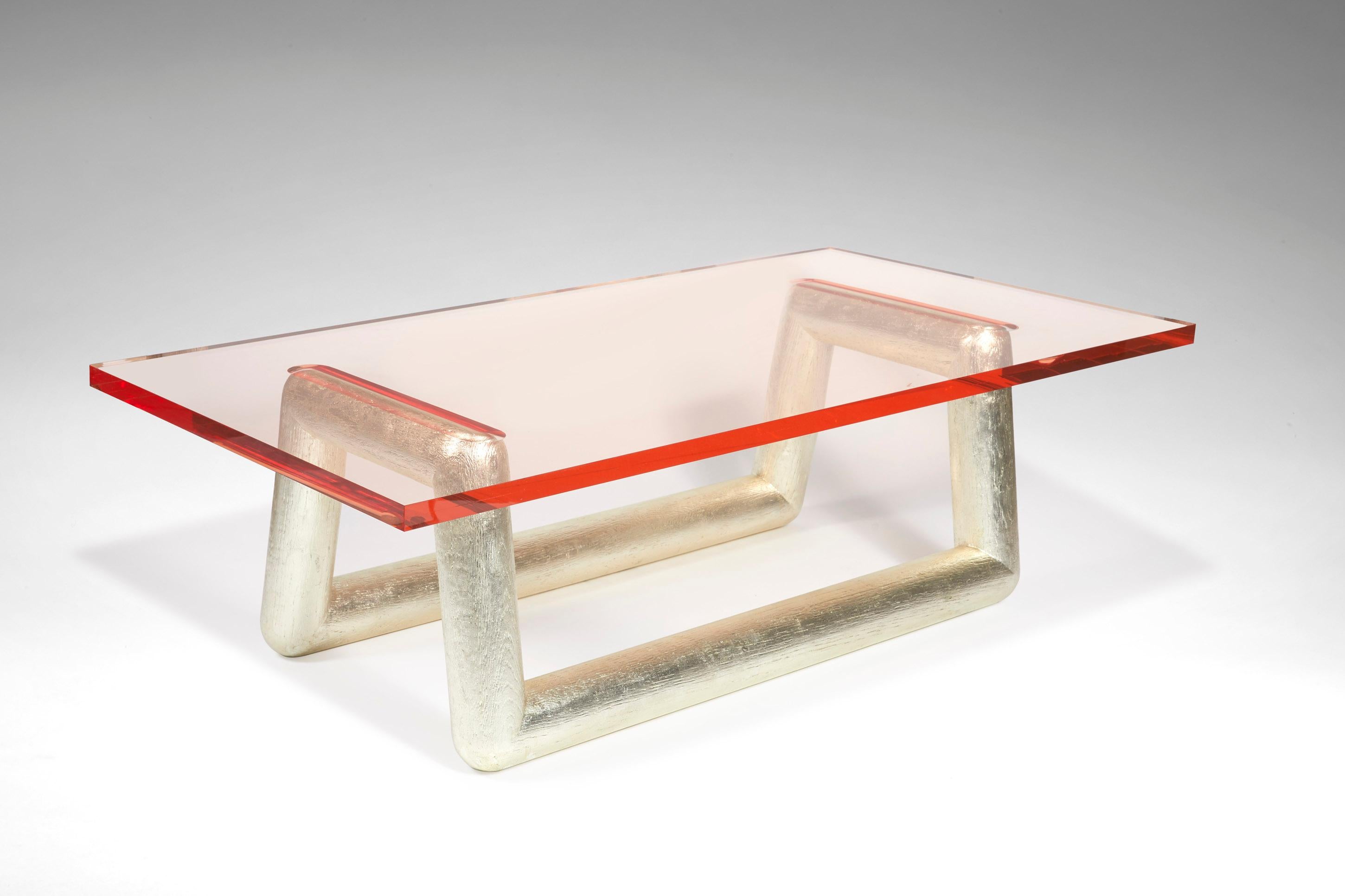 Jelly.
Cat-Berro edition, 2008.
Coffee table.
Top in transparent acrylic.
Legs in sanded oak covered with colored varnished aluminium leaves or golden leaves.
Measures: L 60’’. H 17’’. P 29 ½ ’’.
L 150cm. H 43cm. P 75cm.

Signed piece of a limited