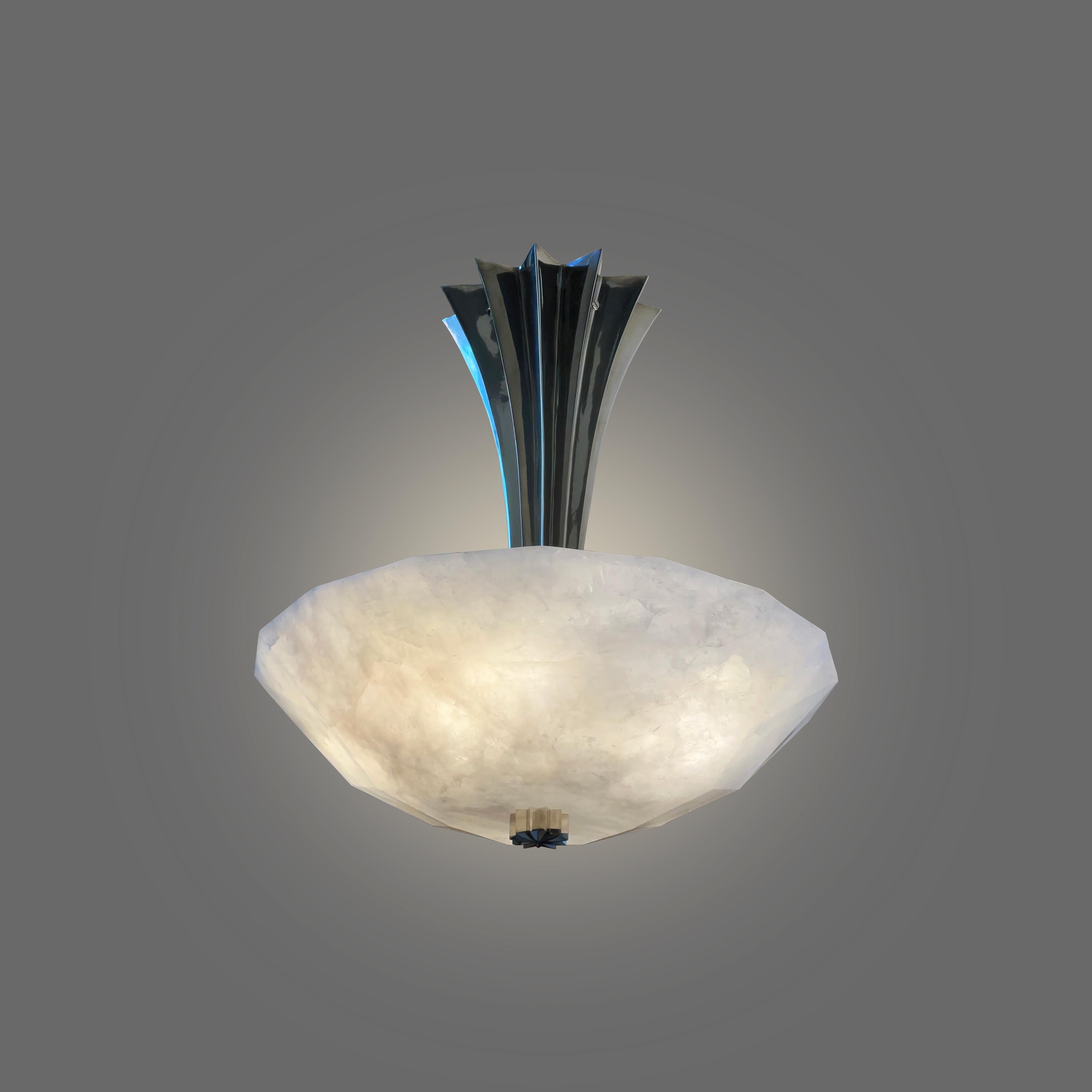 Finely carved rock crystal semi flush mount with polish nickel post. Created by Phoenix Gallery NYC. Four E12 sockets installed. 240w total. Custom size, finish upon request.