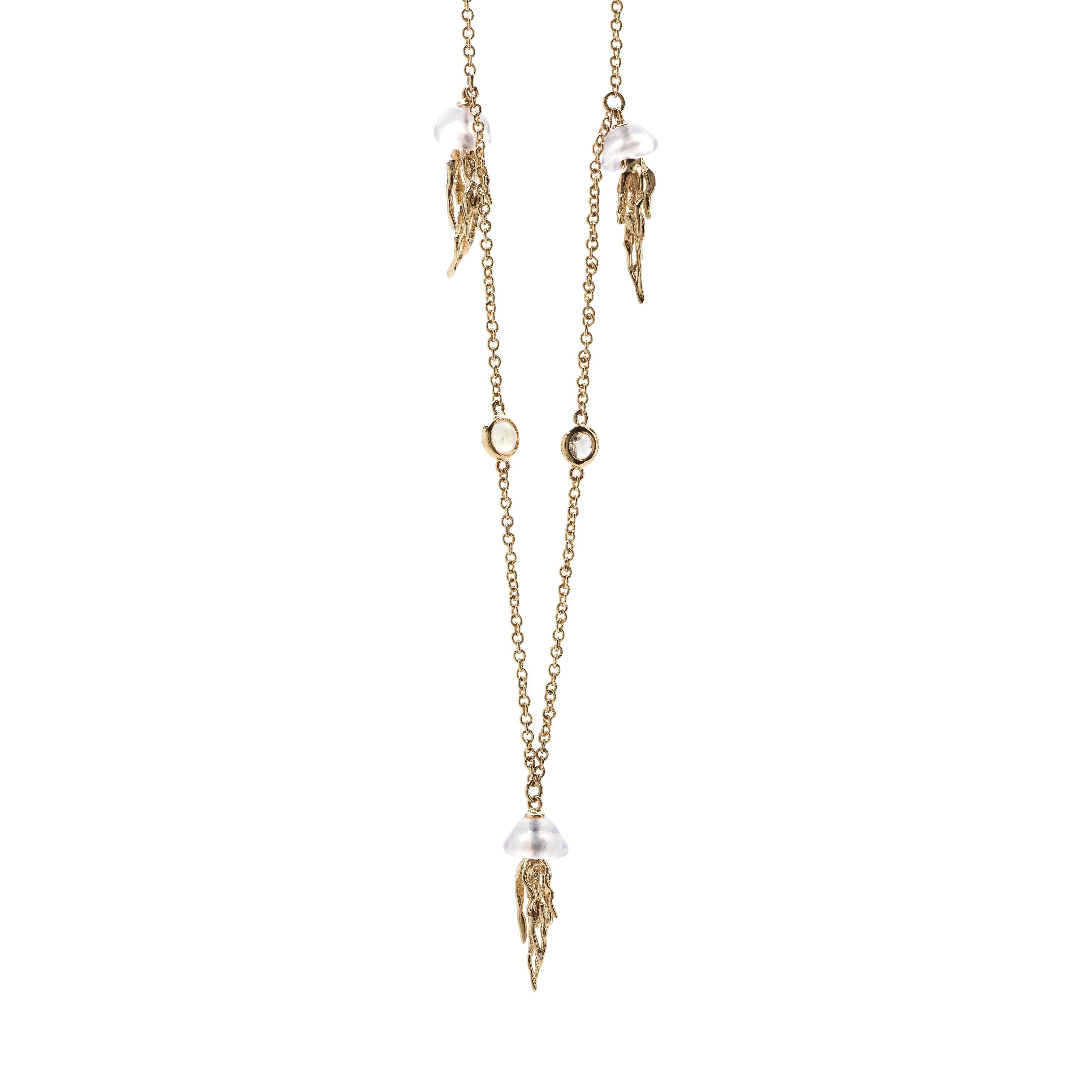 The delicate Jellyfish Necklace captures this sea creature’s graceful movements. Designed in 18k yellow gold, the necklace’s chain is set with jellyfish crafted in moonstone and 18k yellow gold along its length, with the chain embellished with